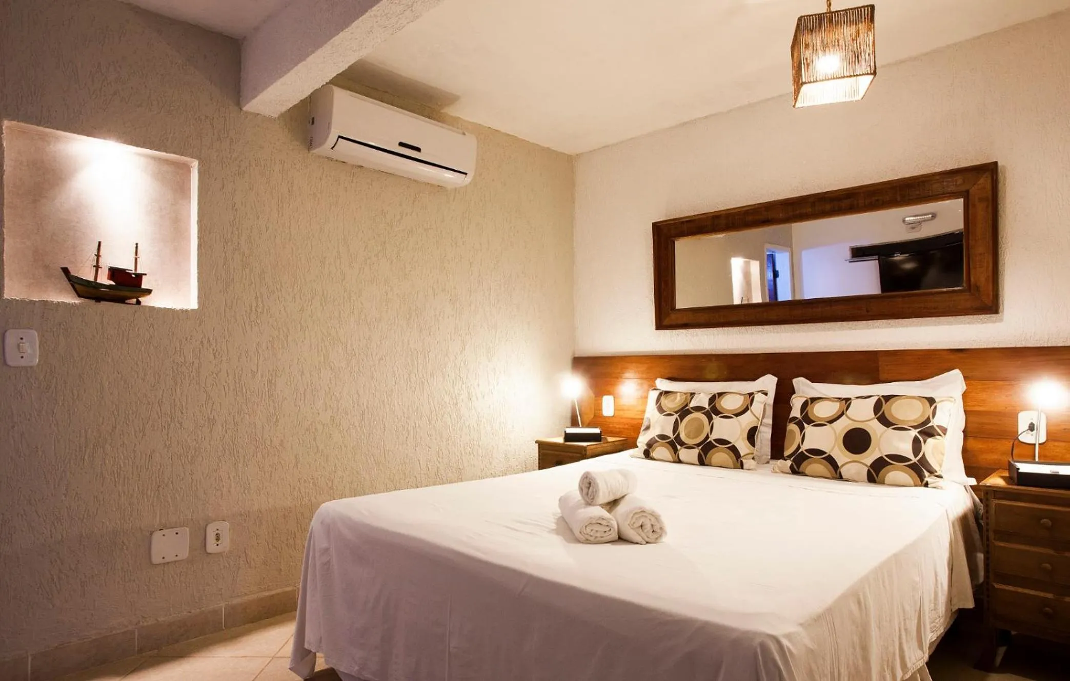 Bed in Pousada Praia João Fernandes