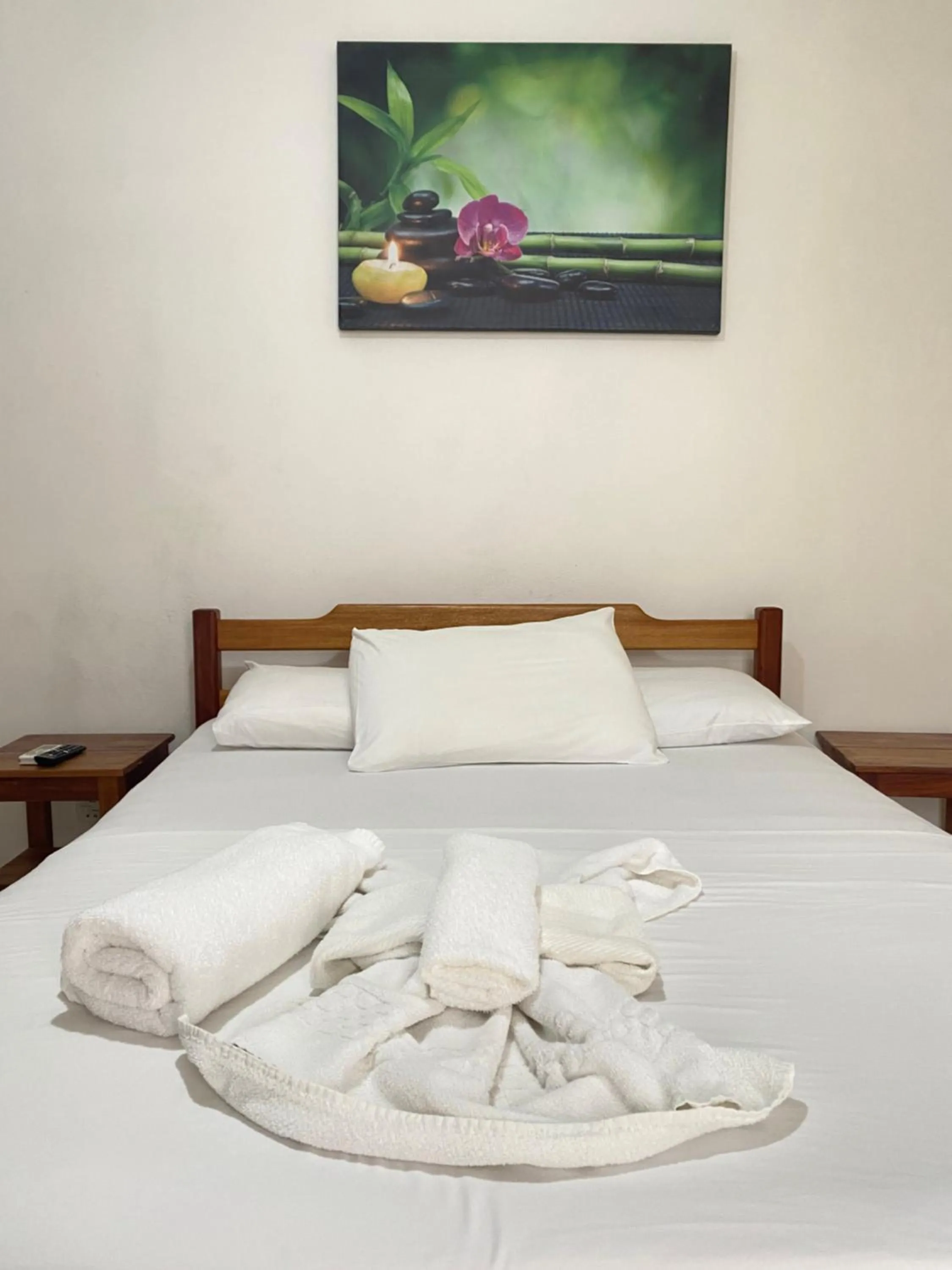 Bed in Pousada Arraial Suites