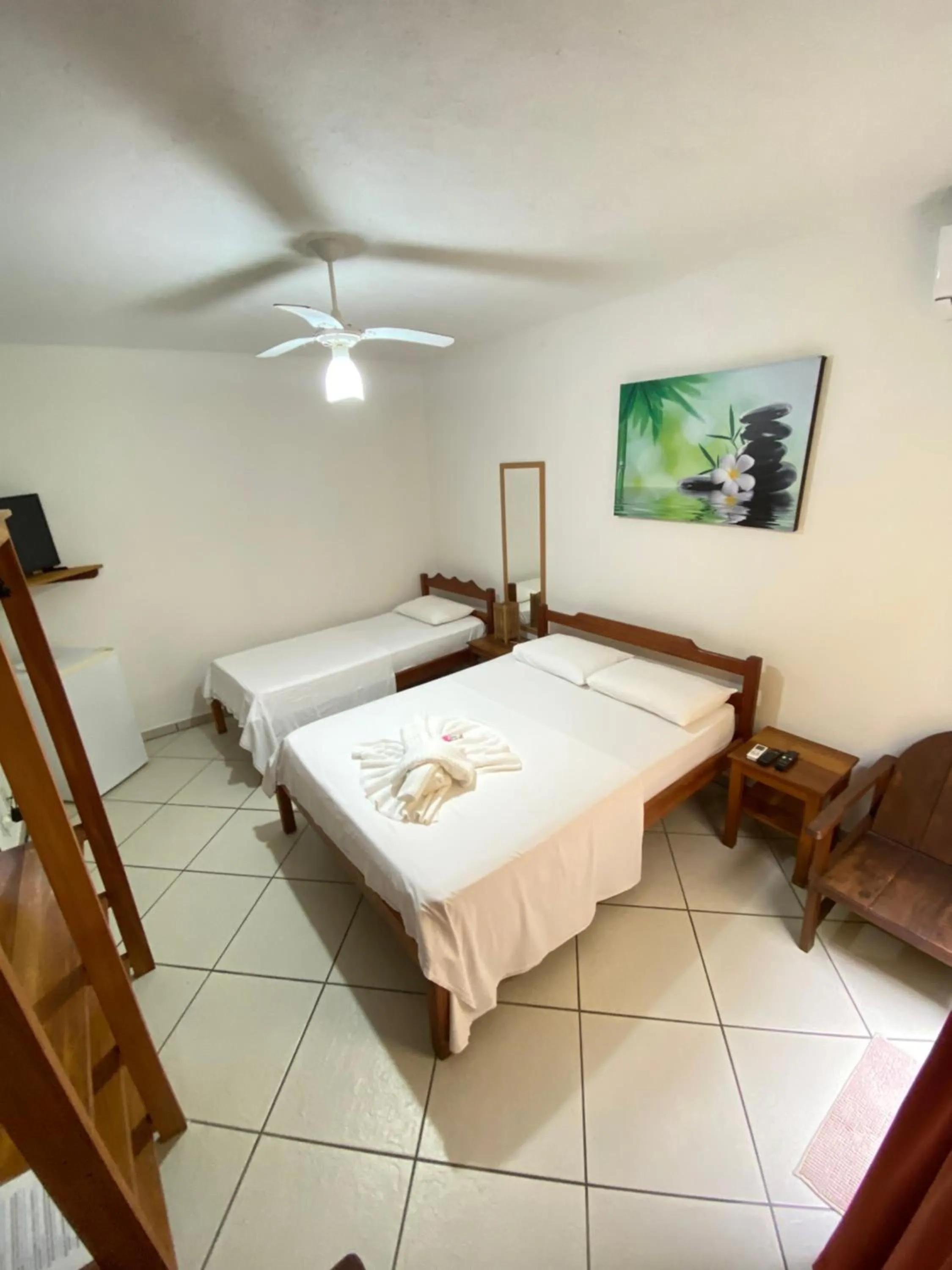 Bed in Pousada Arraial Suites