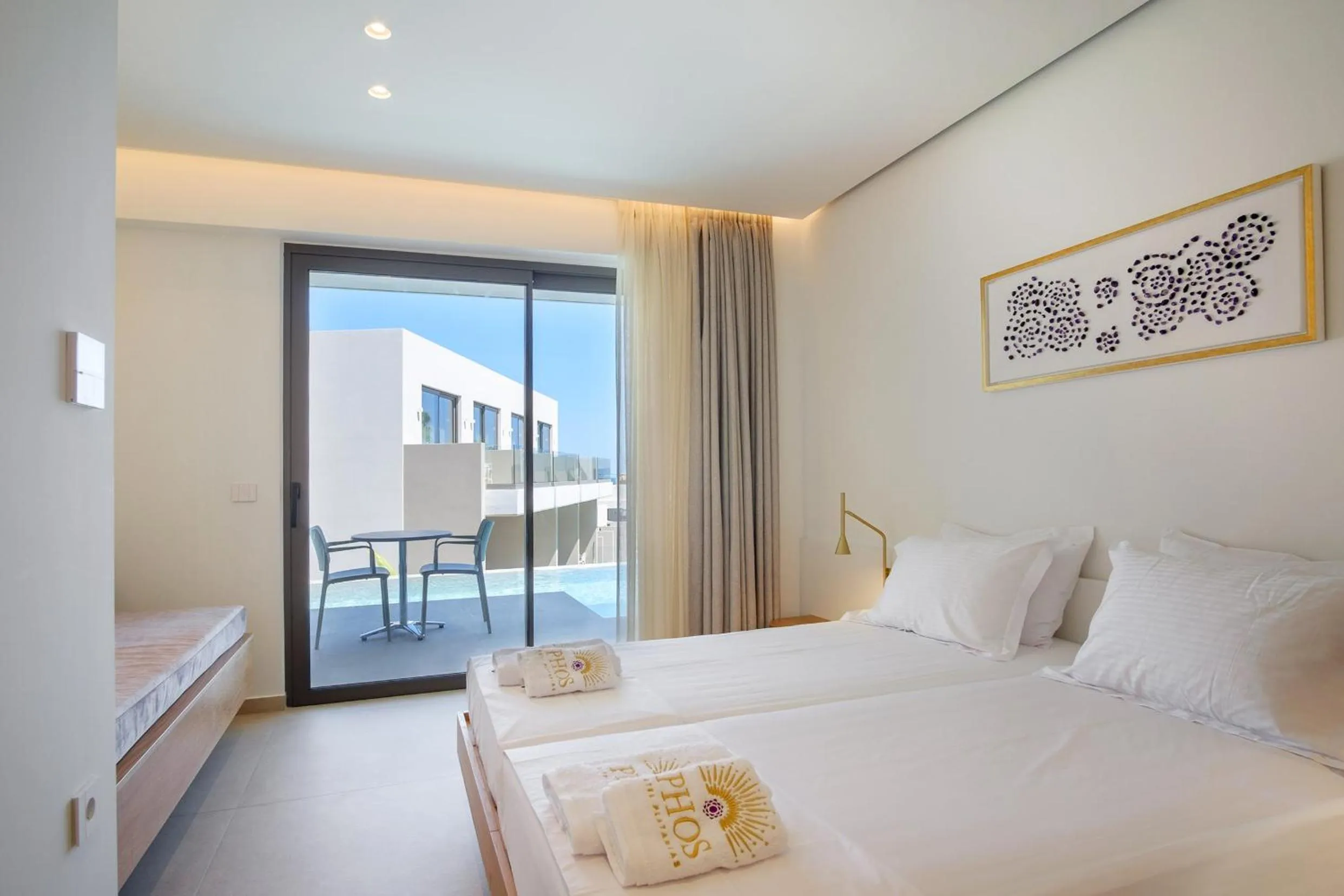 Bed in Phos Hotel Adults Only