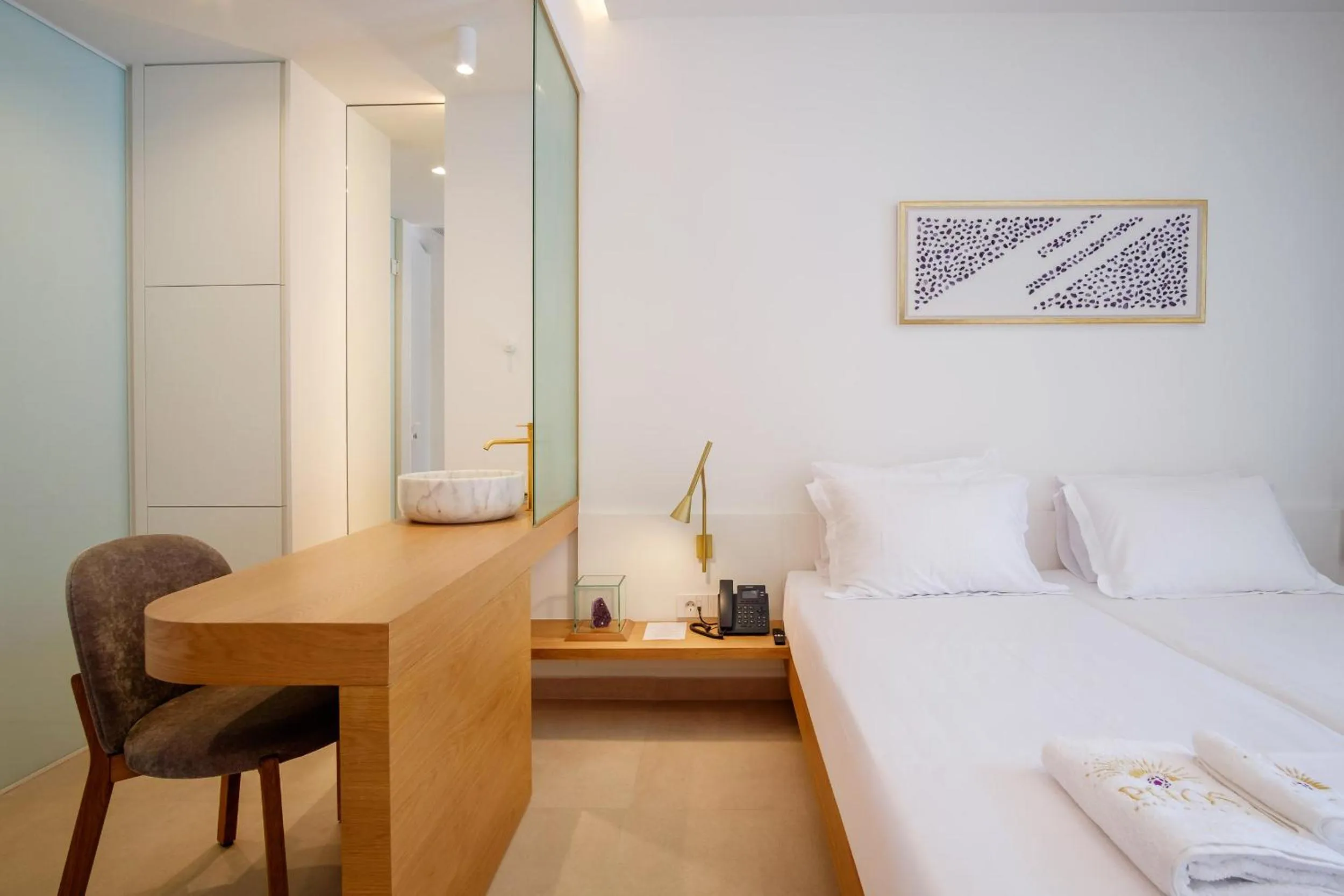 Bed in Phos Hotel Adults Only