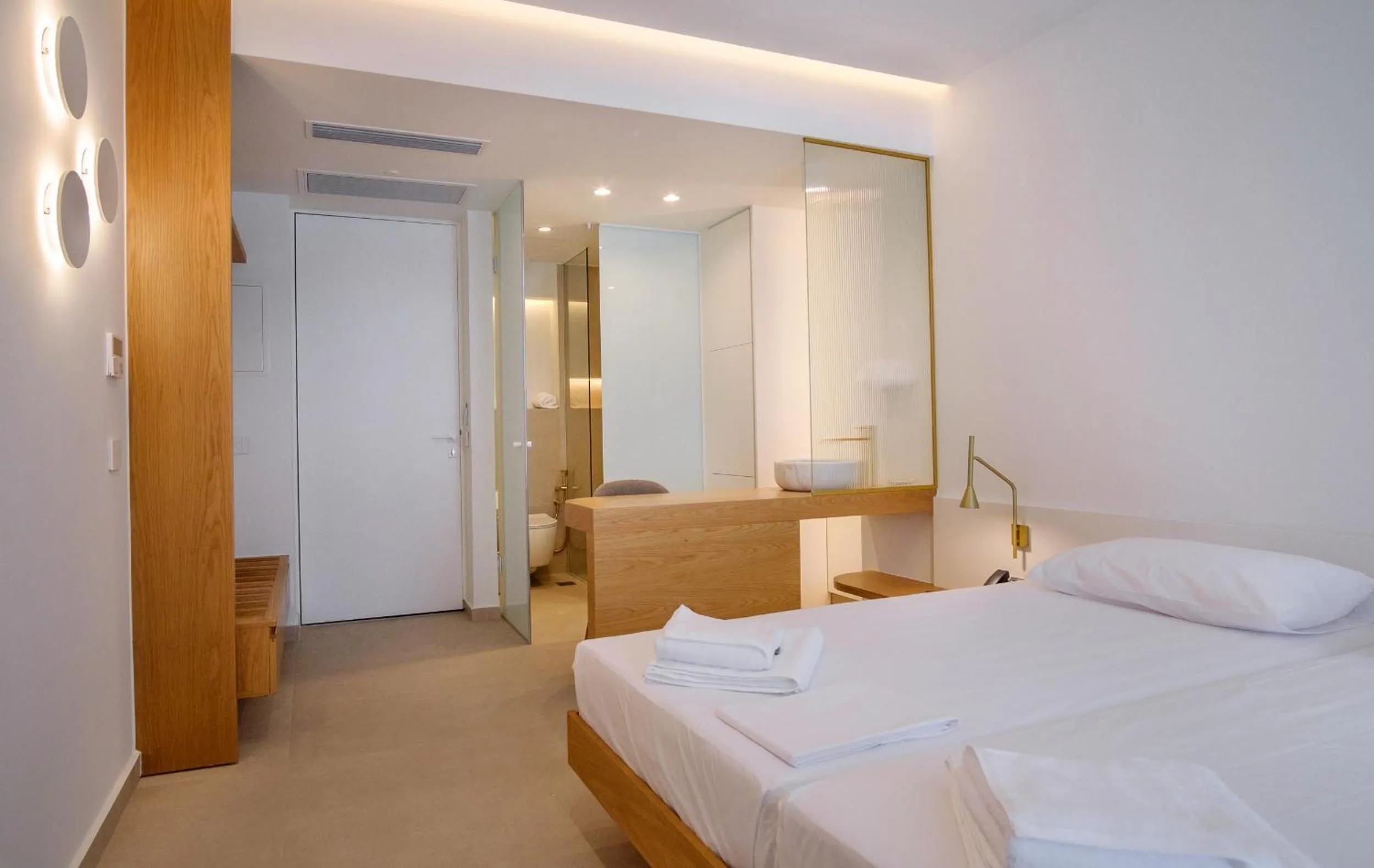 Bed in Phos Hotel Adults Only