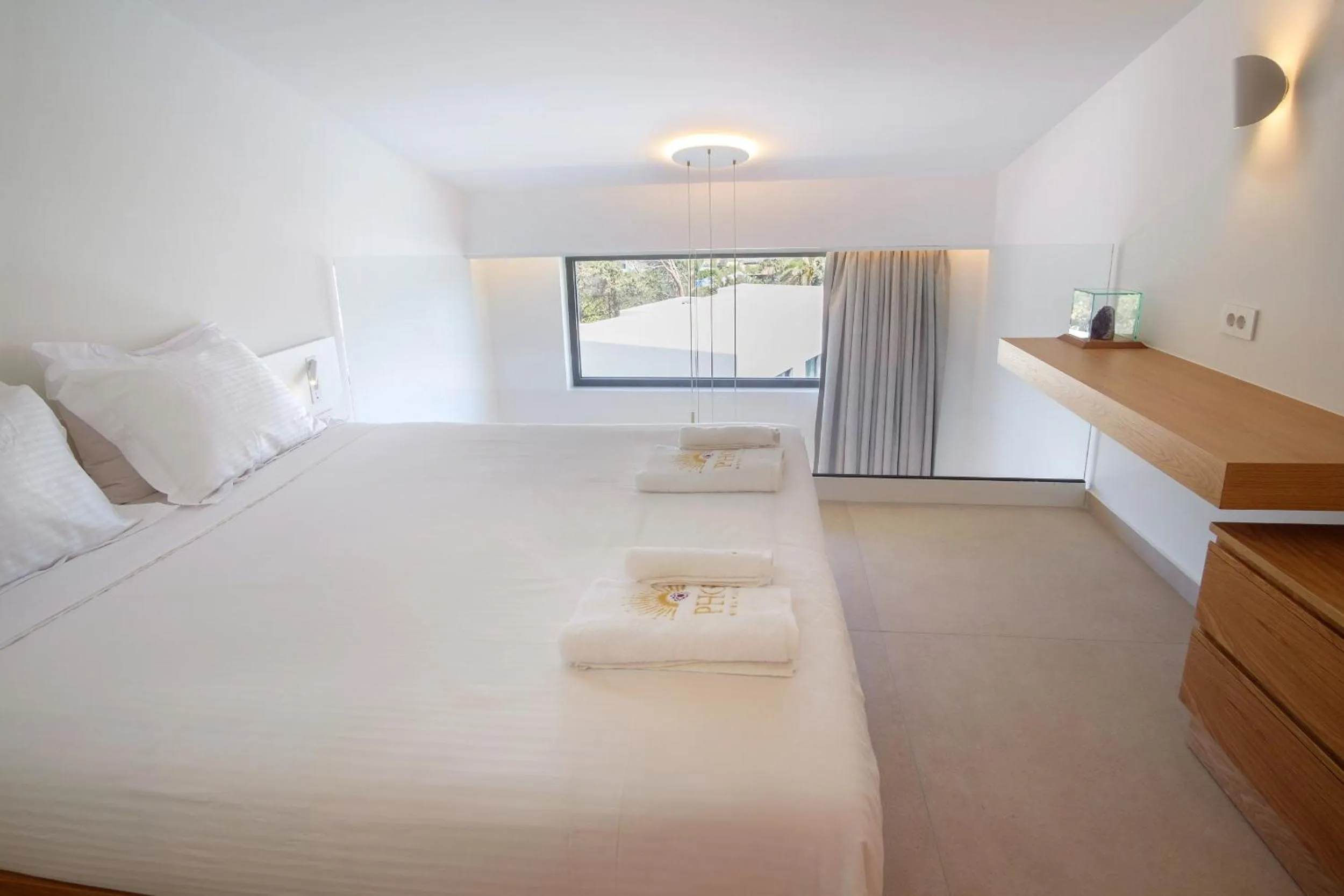 Bed in Phos Hotel Adults Only