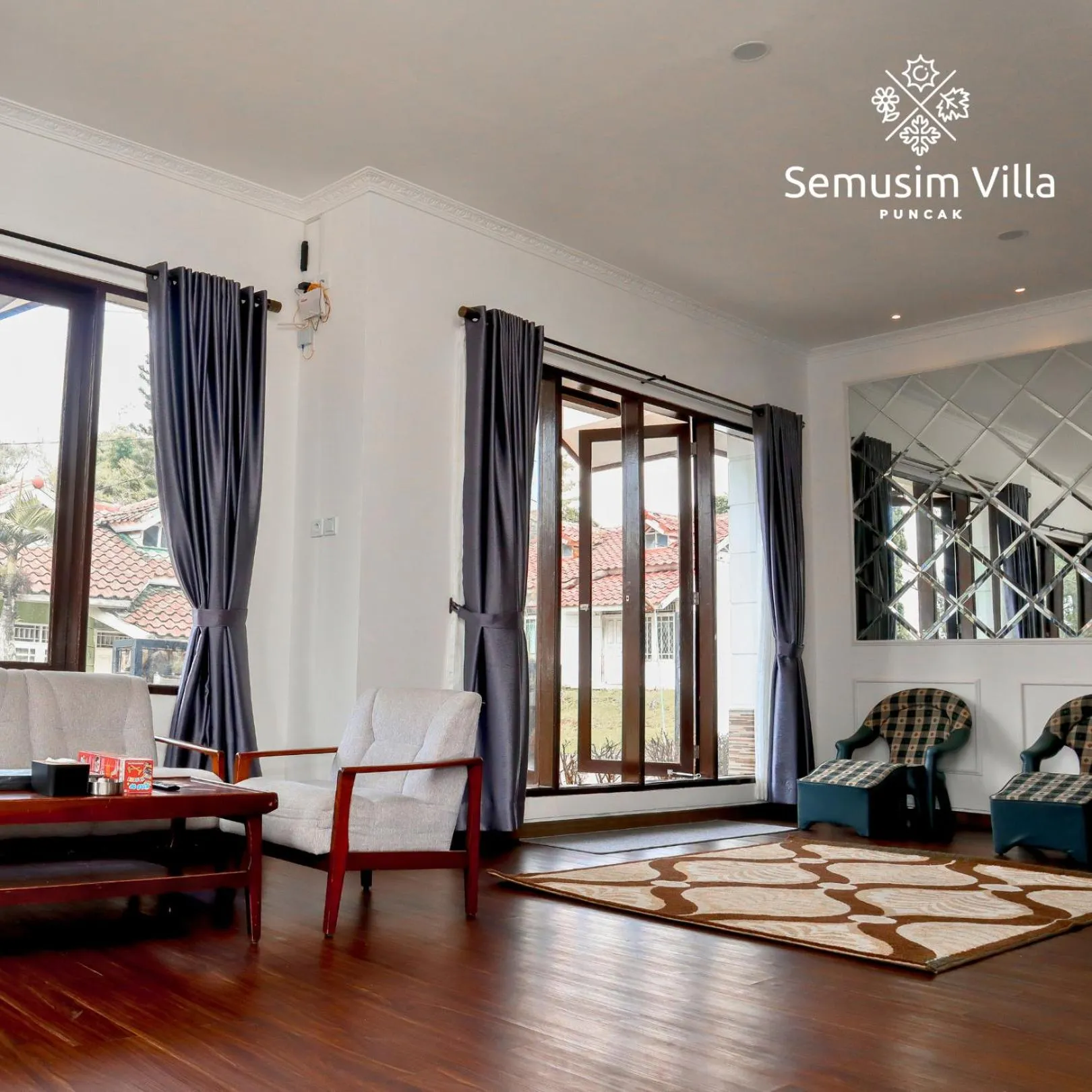 Living room in Sierra by Semusim Villa