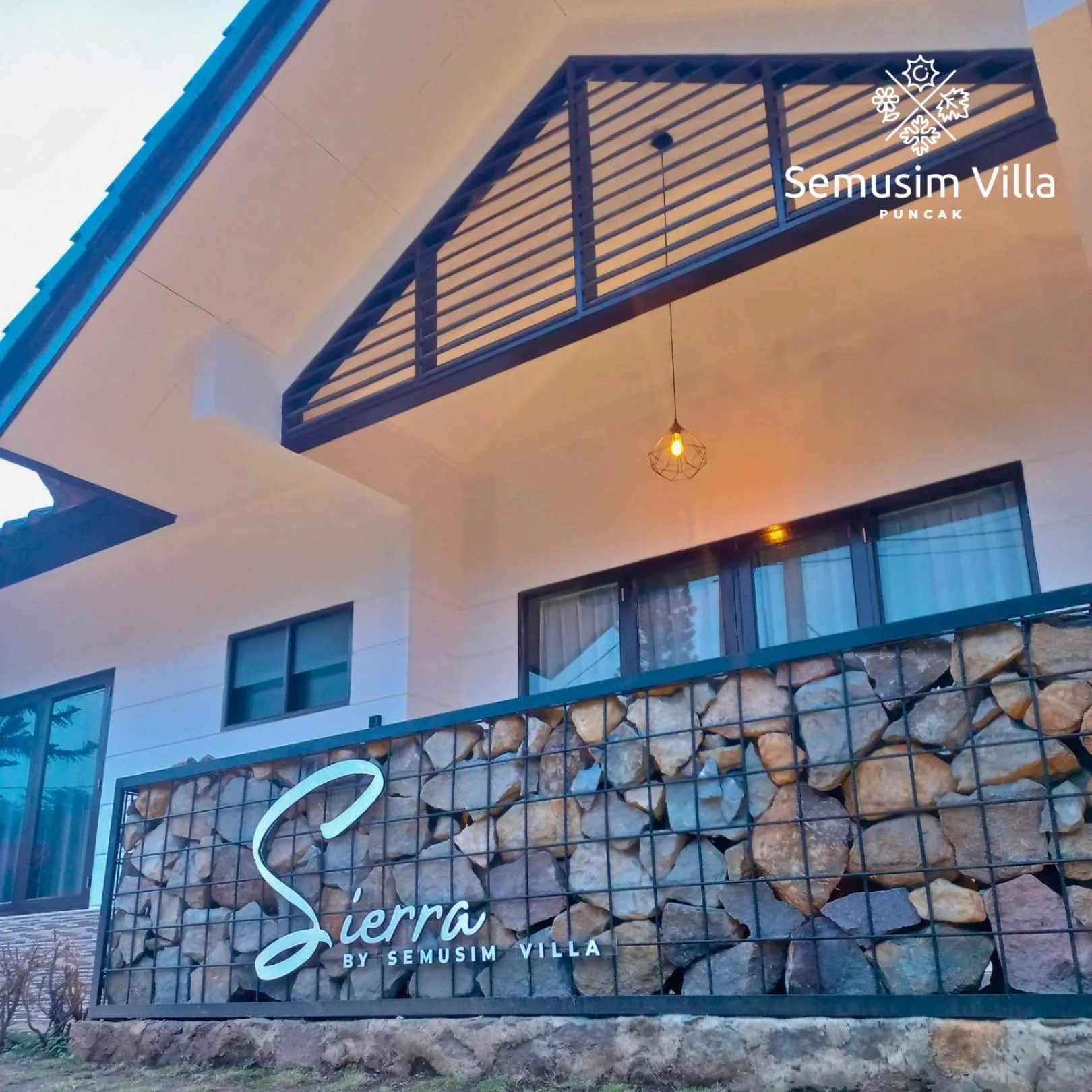 Facade/entrance in Sierra by Semusim Villa