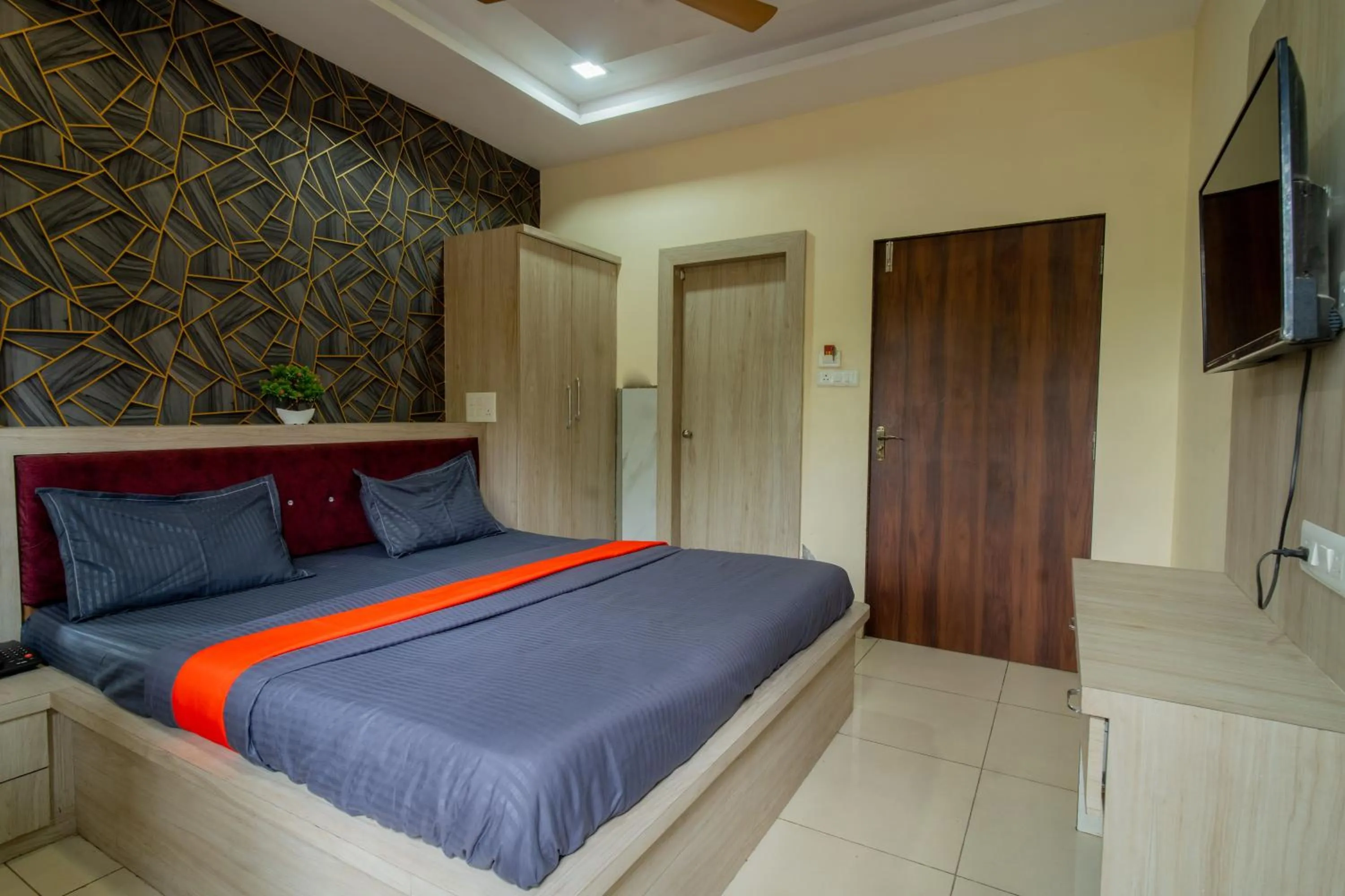 Bed in Majestic Hotel and Restro