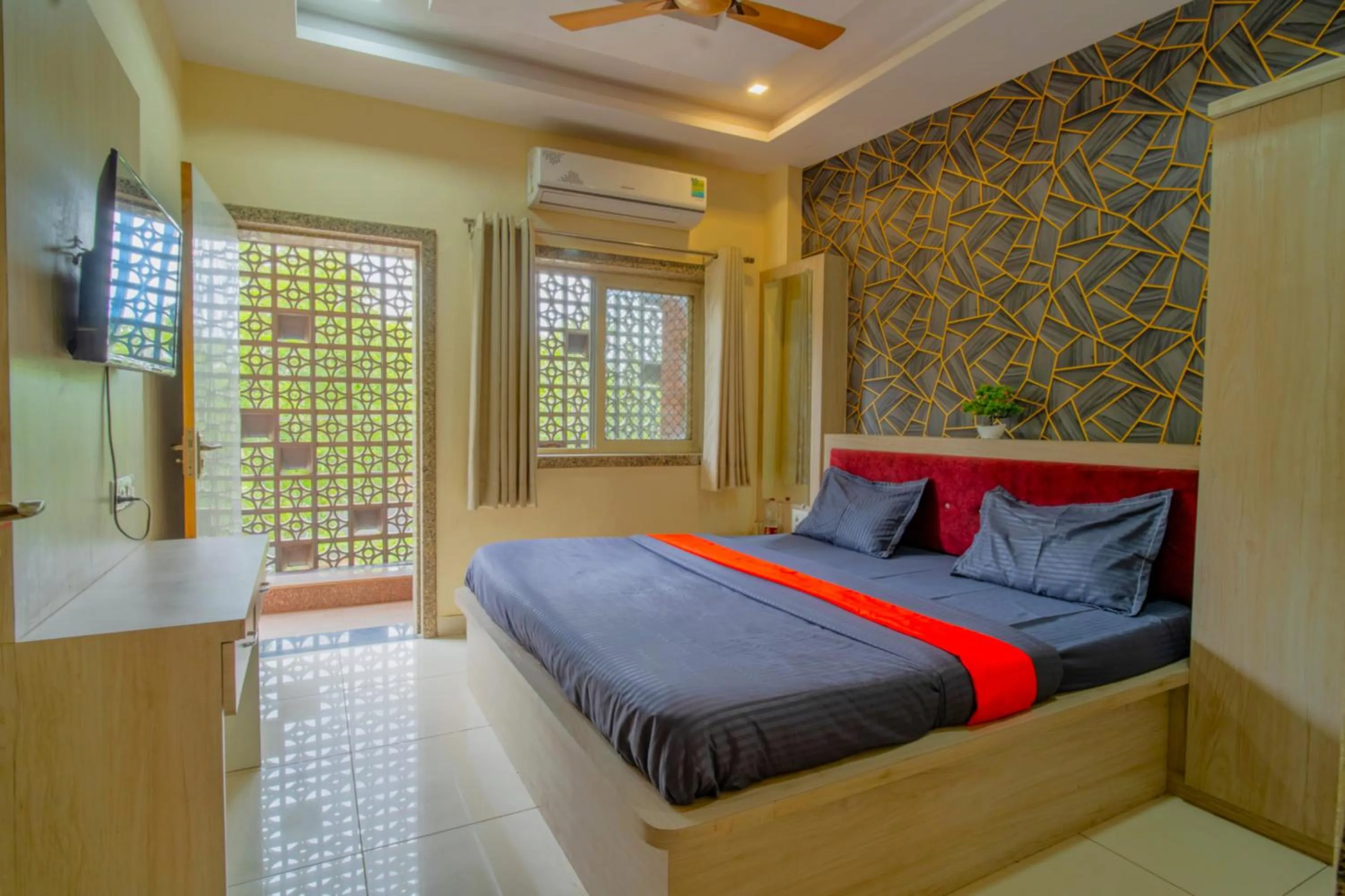 Bed in Majestic Hotel and Restro