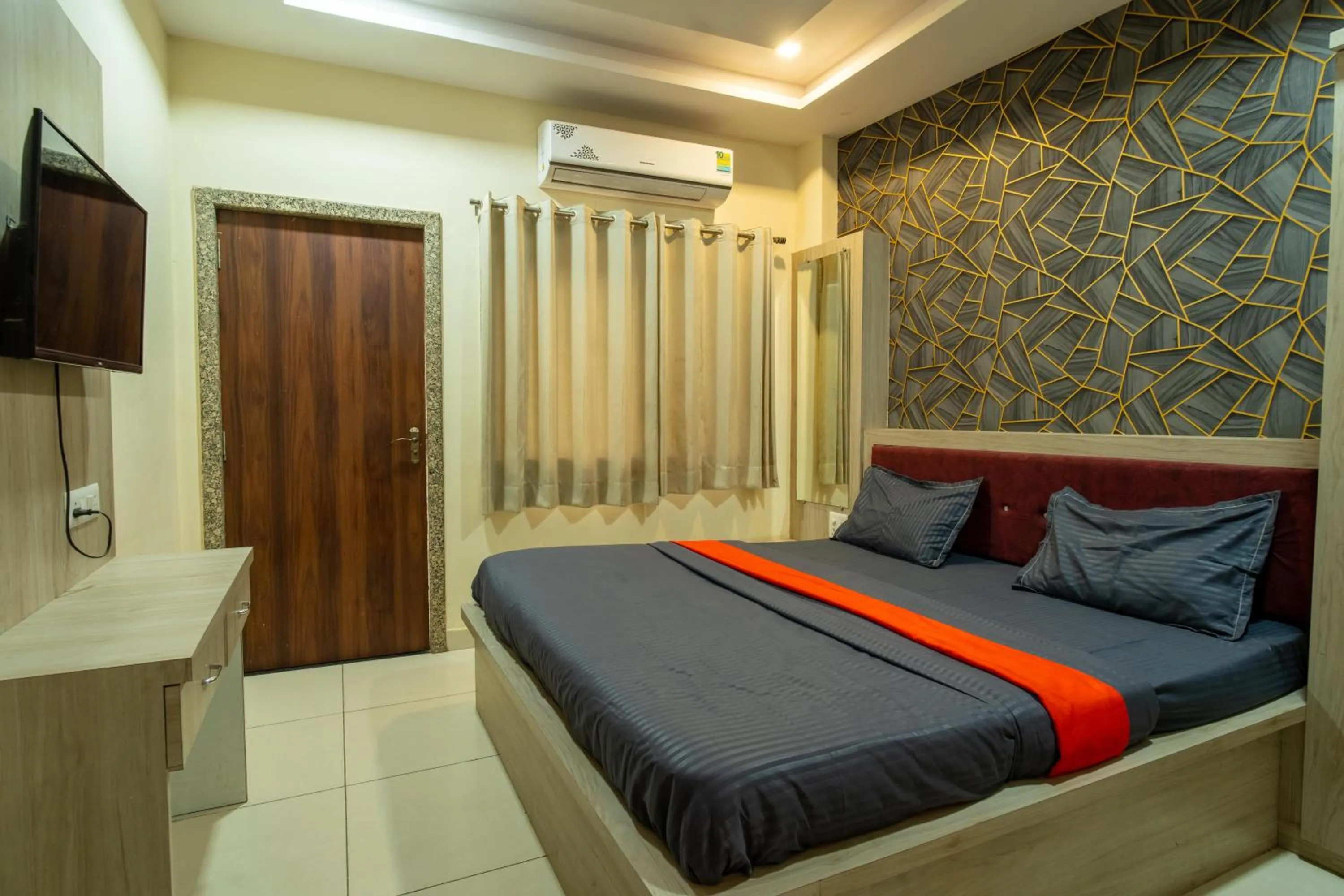 Bed in Majestic Hotel and Restro