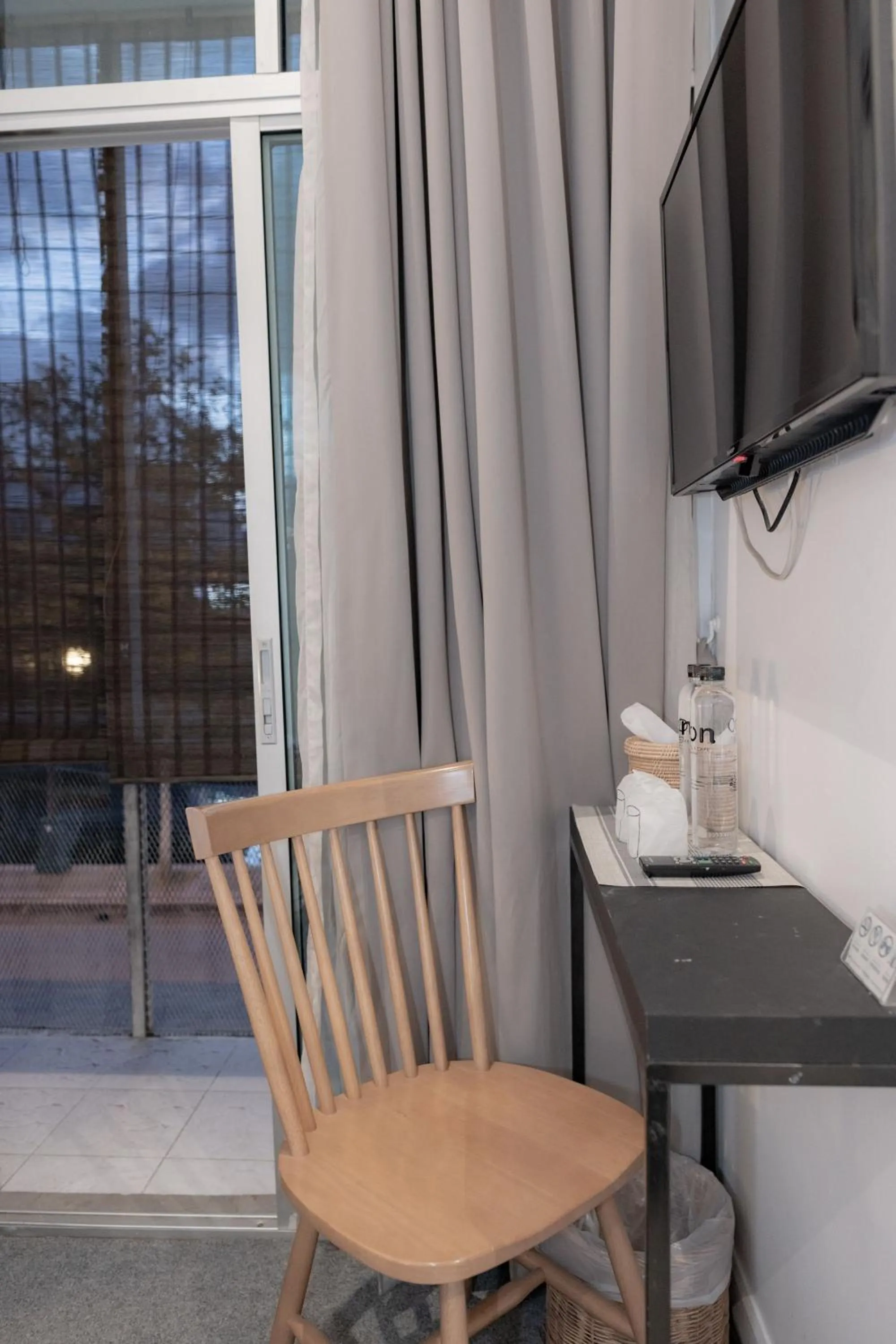 Bedroom in Oon Poshtel x Cafe