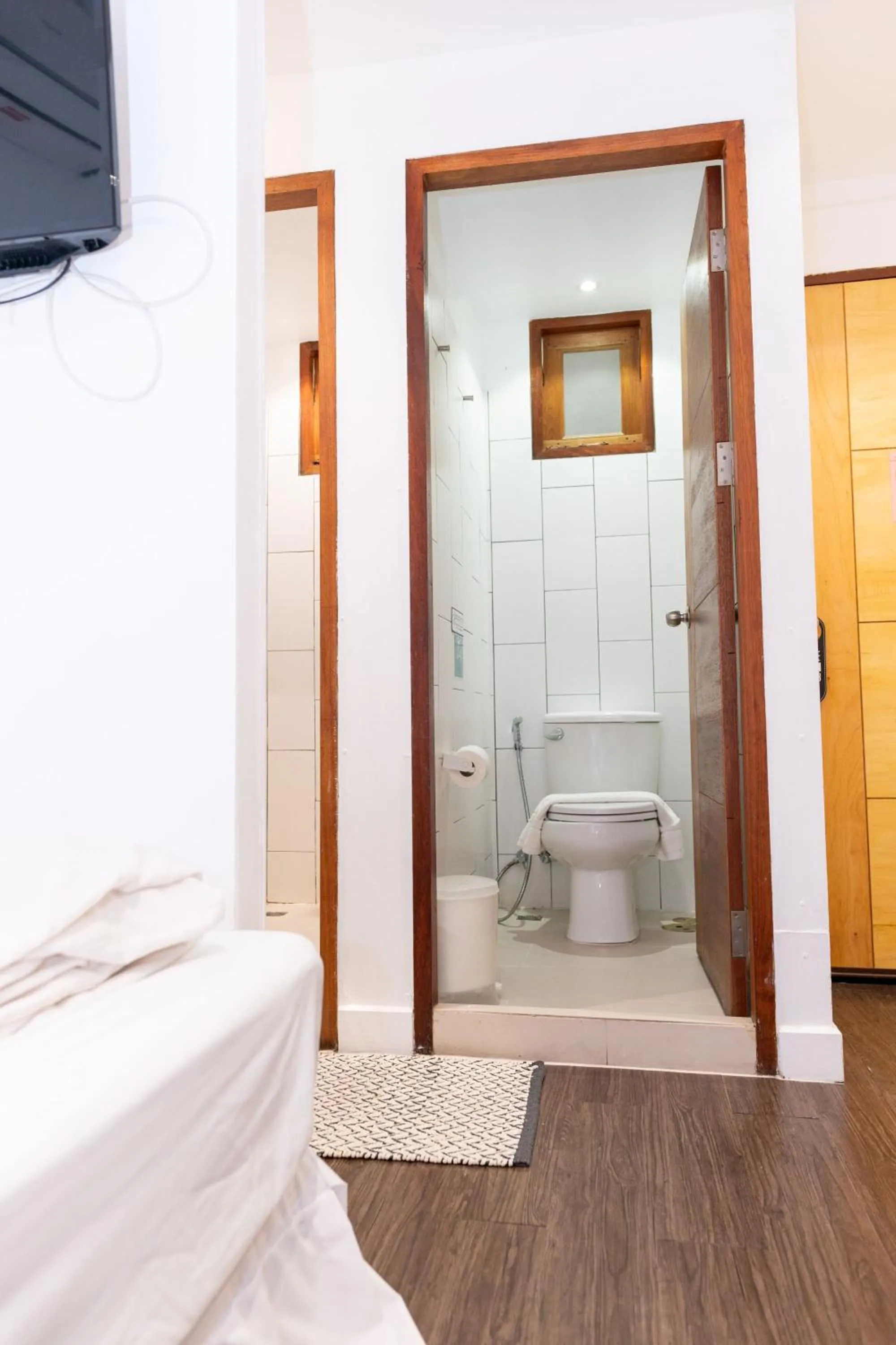 Bedroom in Oon Poshtel x Cafe