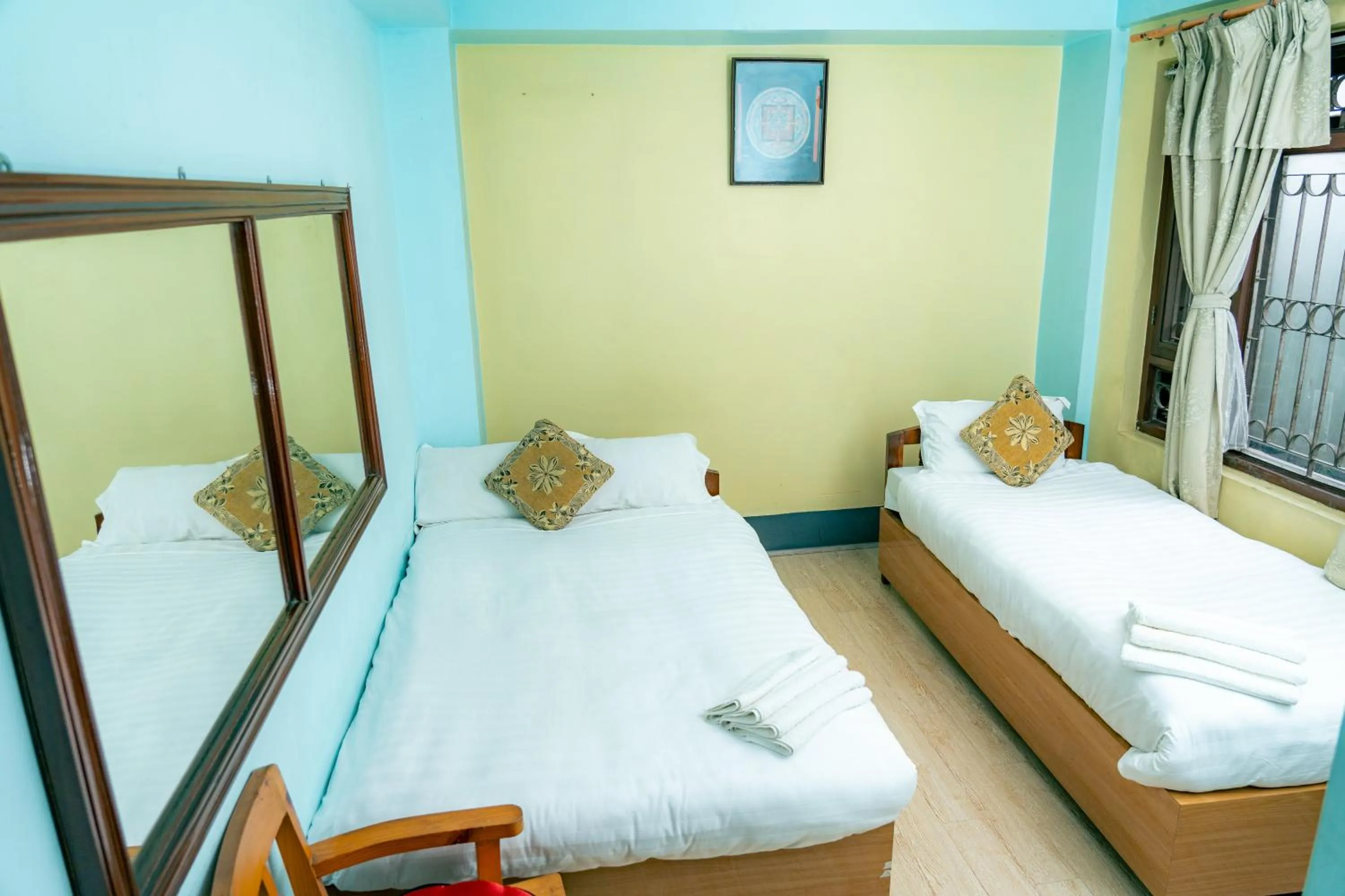 Bed in Golden Gate Guest House