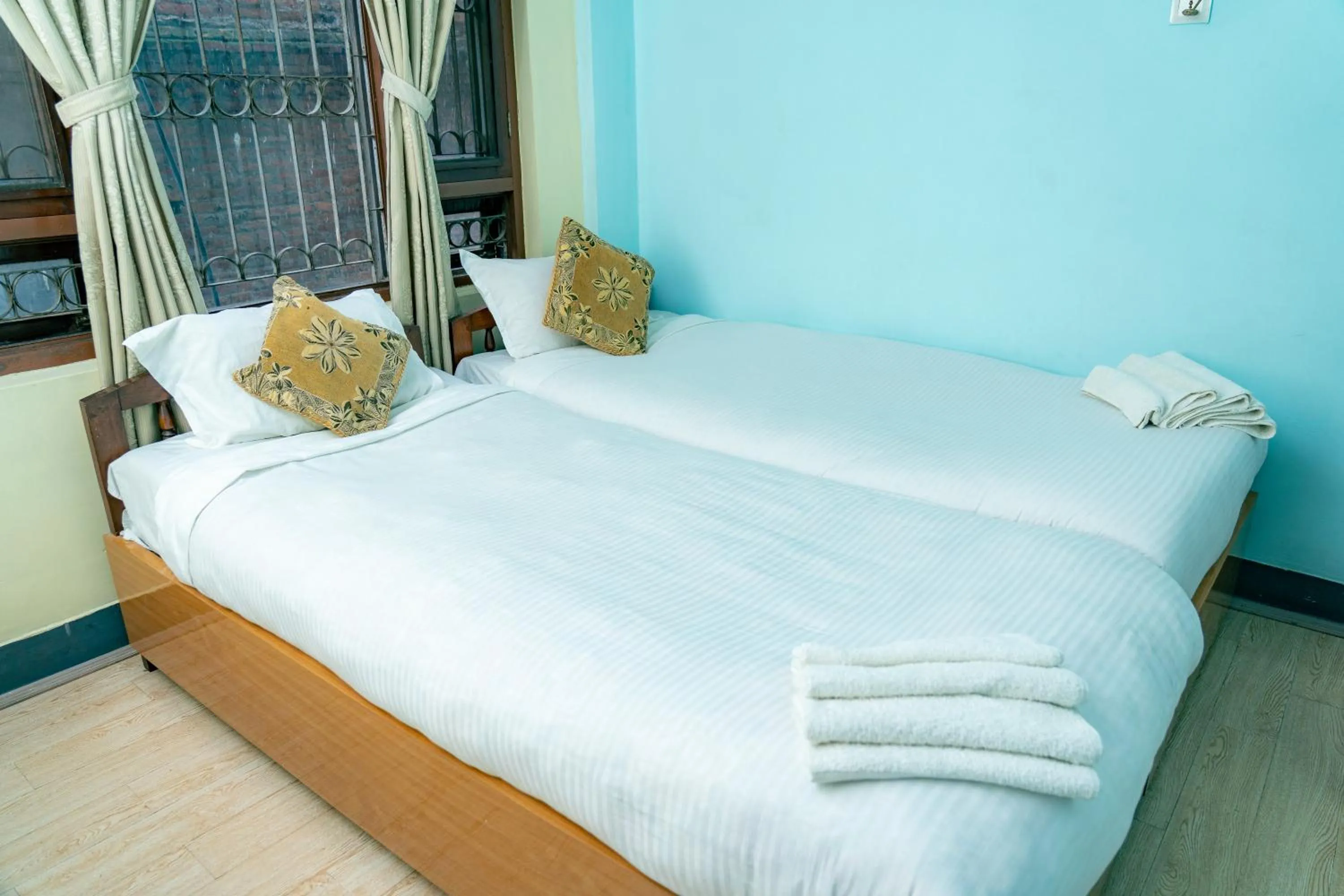 Bed in Golden Gate Guest House