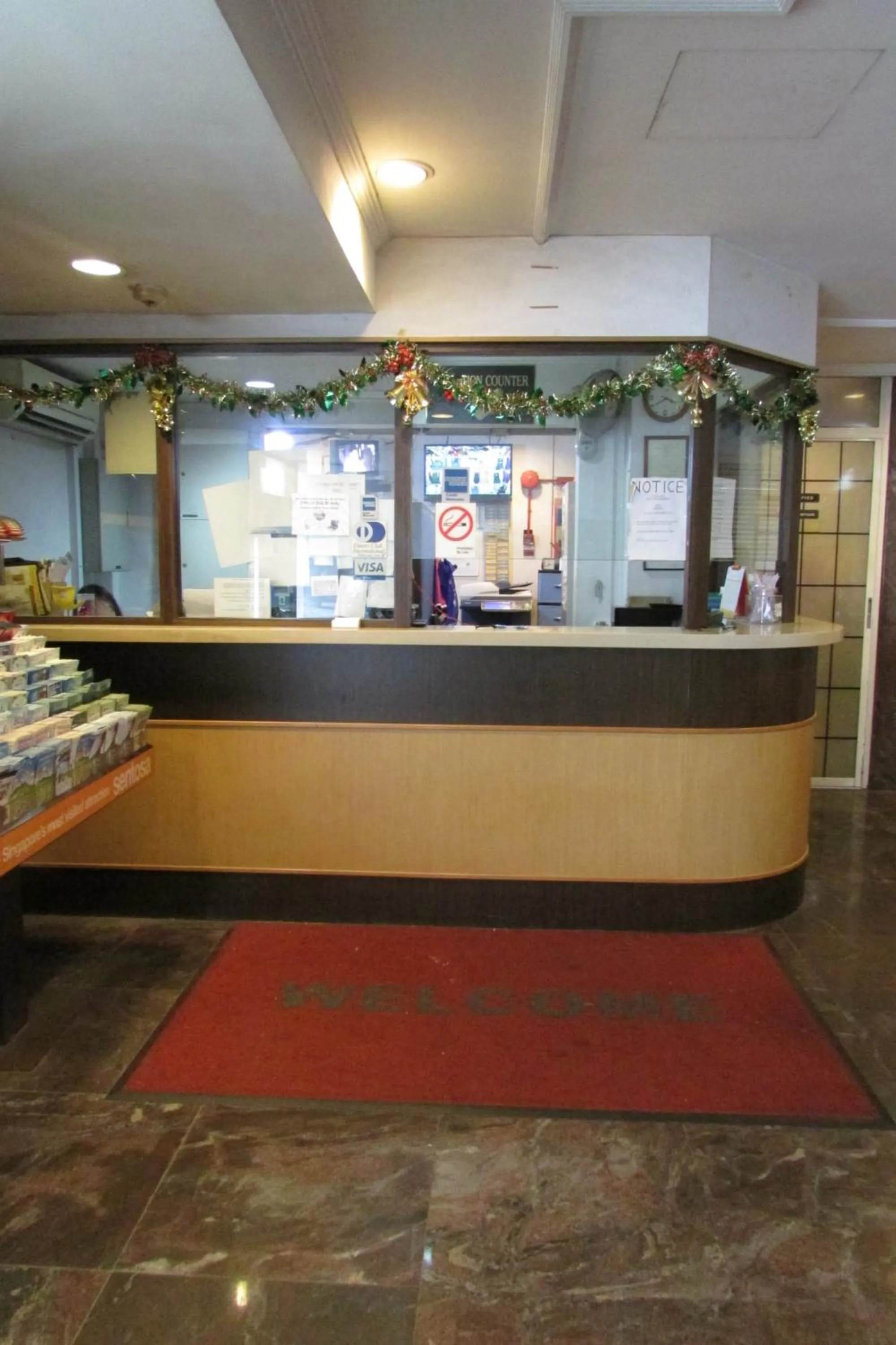 Lobby or reception in New Orchid Hotel