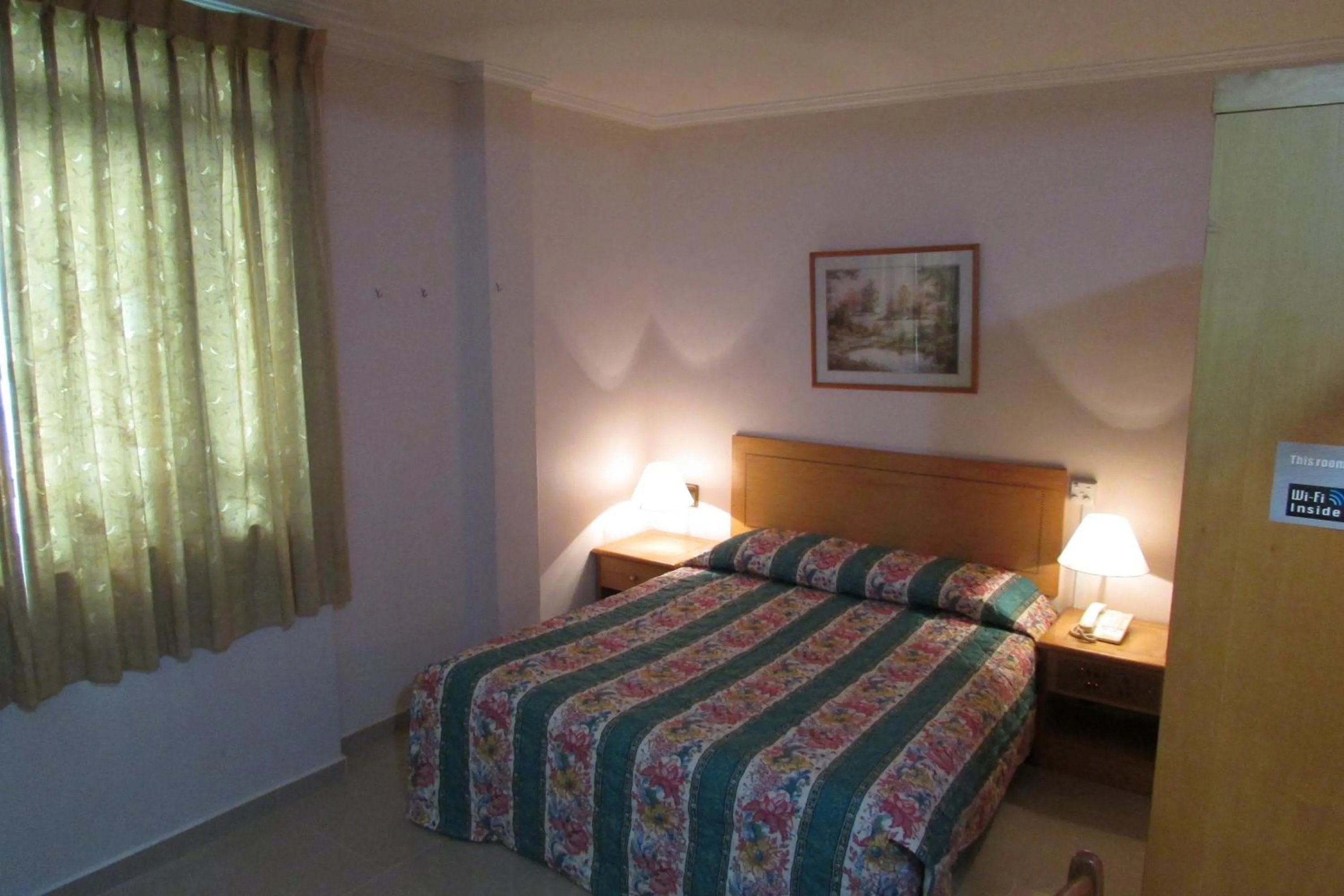 Bed in New Orchid Hotel