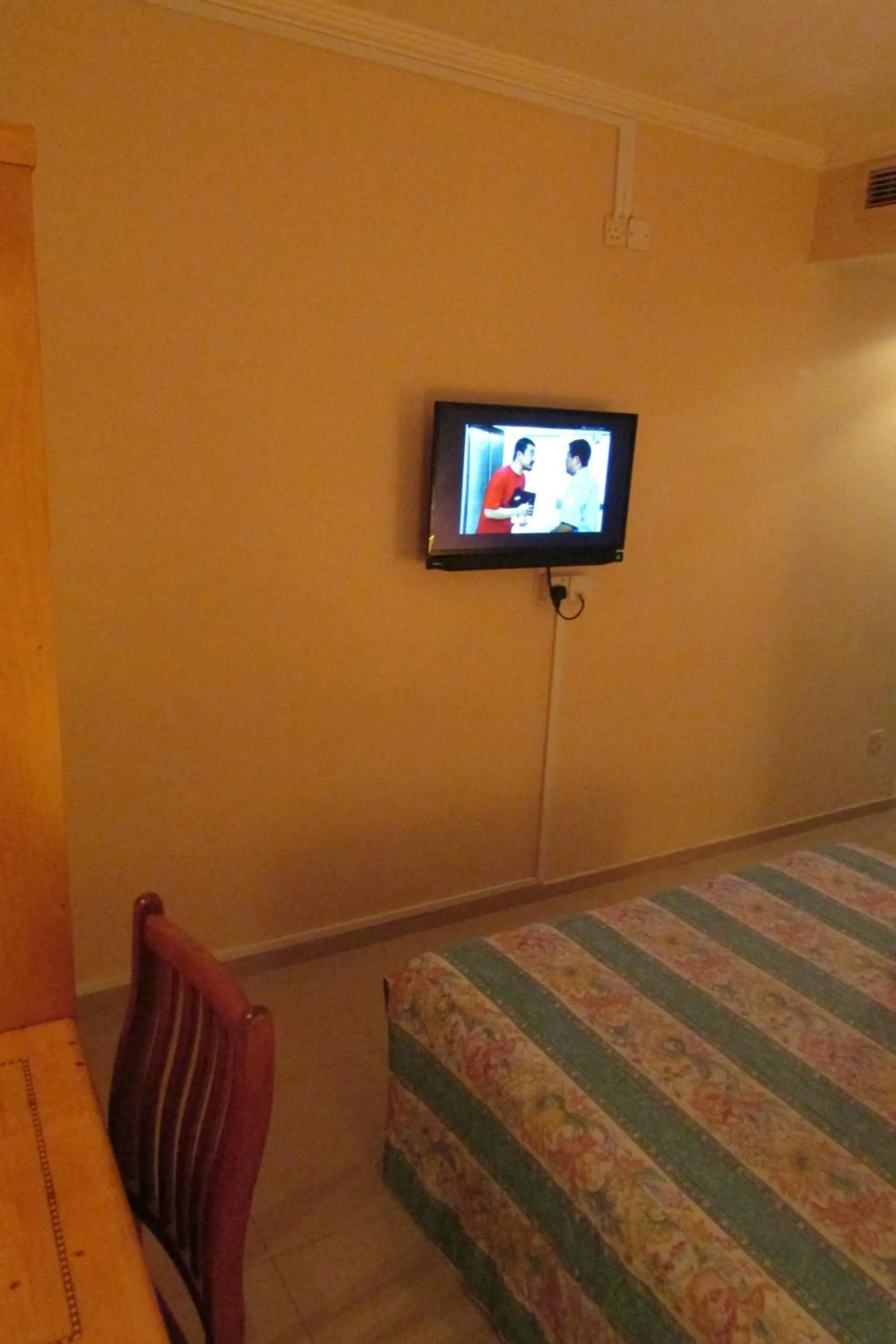 Bed in New Orchid Hotel