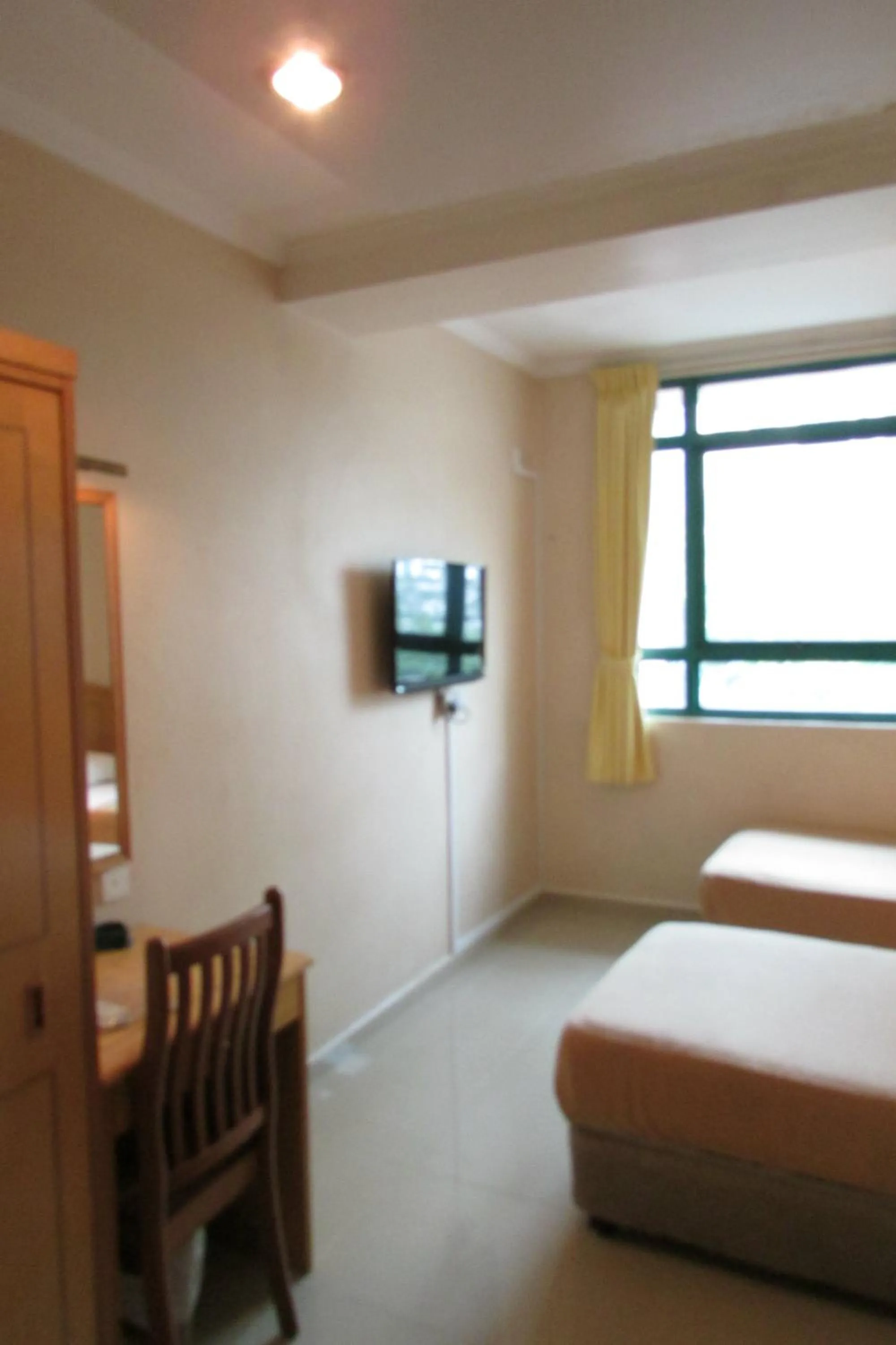 Bed in New Orchid Hotel