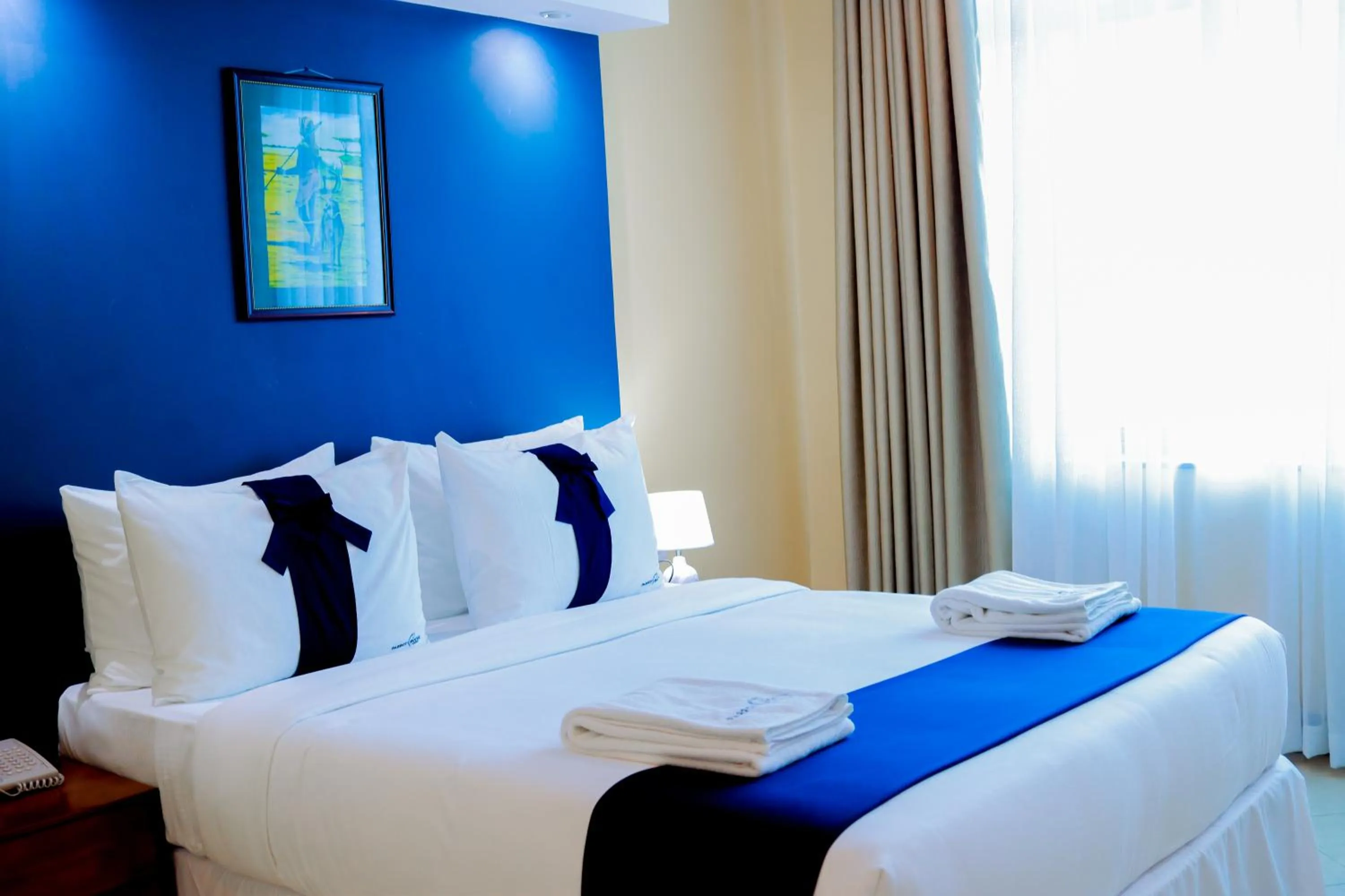 Bedroom in Parrot Hotel Arusha