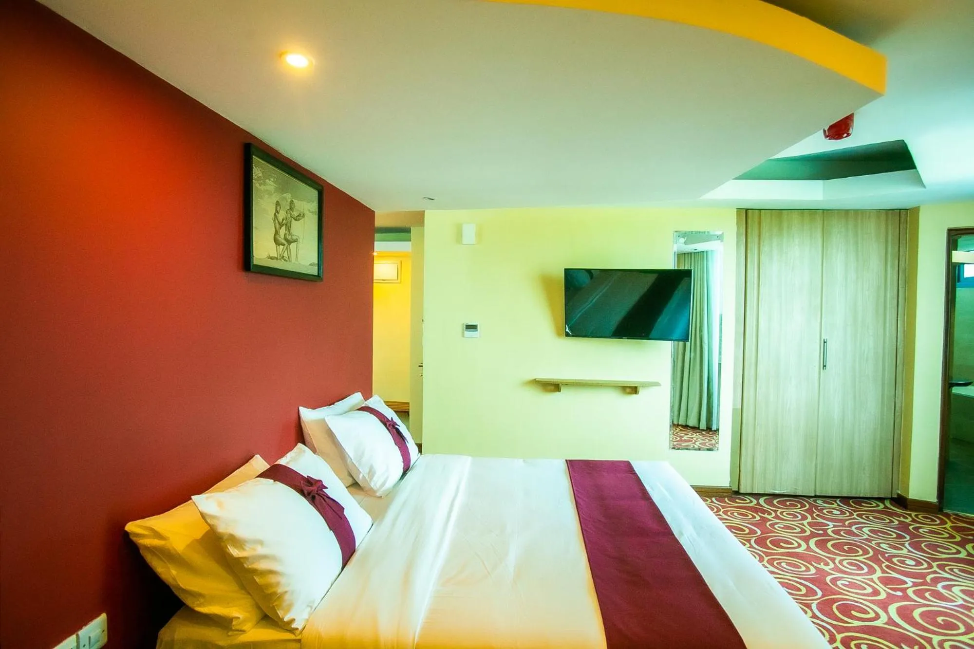 Communal lounge/ TV room in Parrot Hotel Arusha