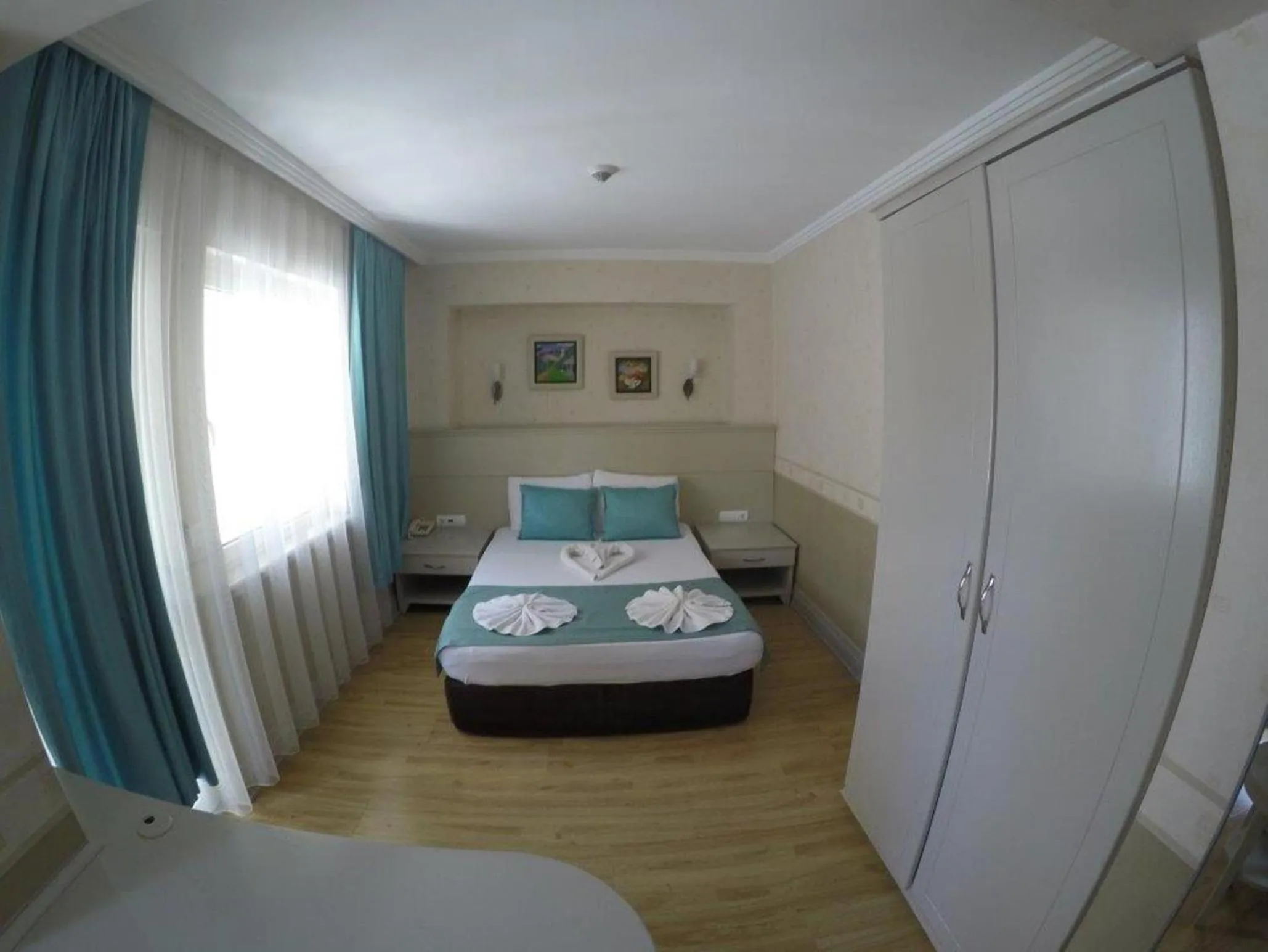 Photo of the whole room, Bed in Almena Hotel