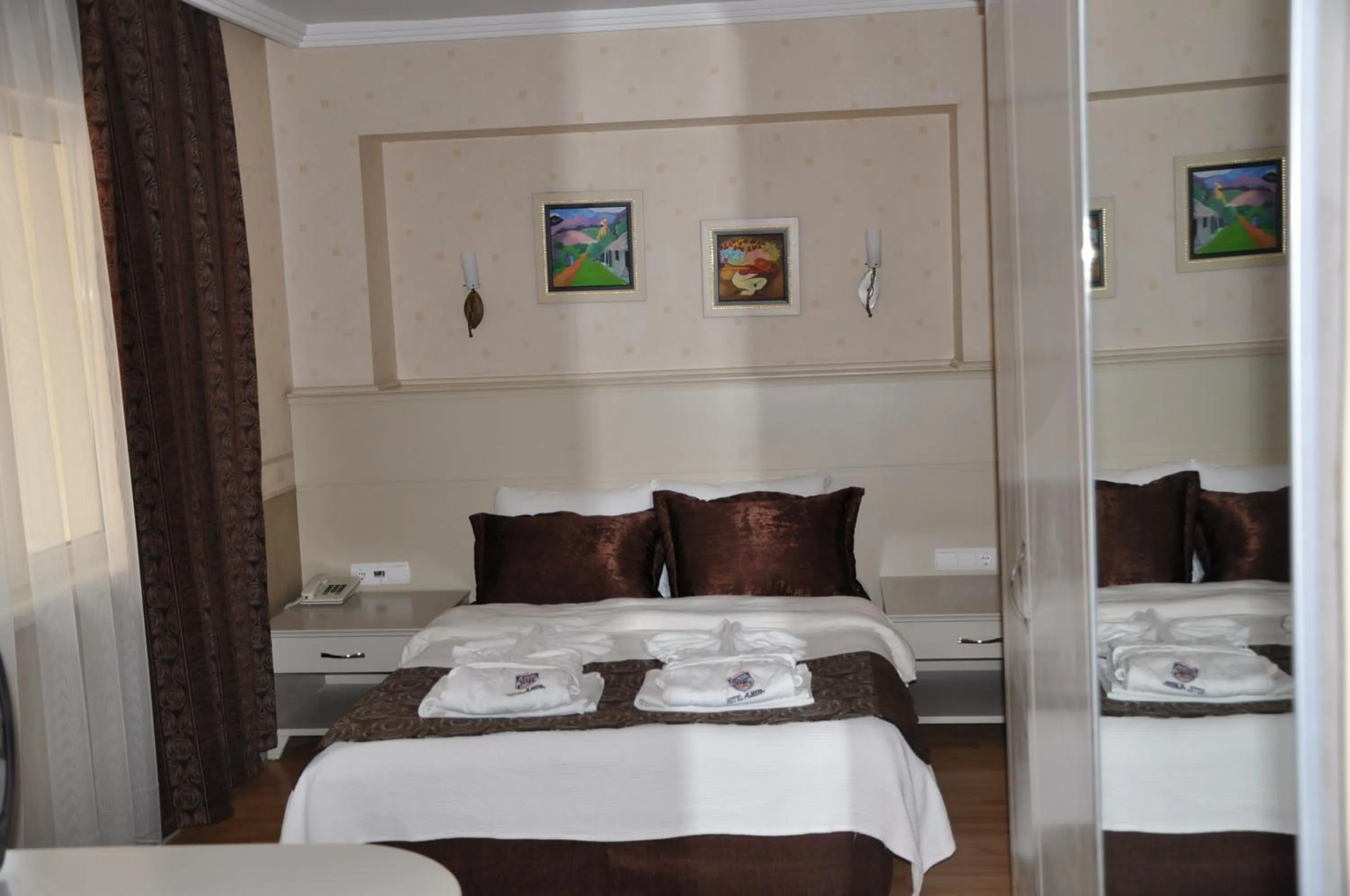 Photo of the whole room, Bed in Almena Hotel