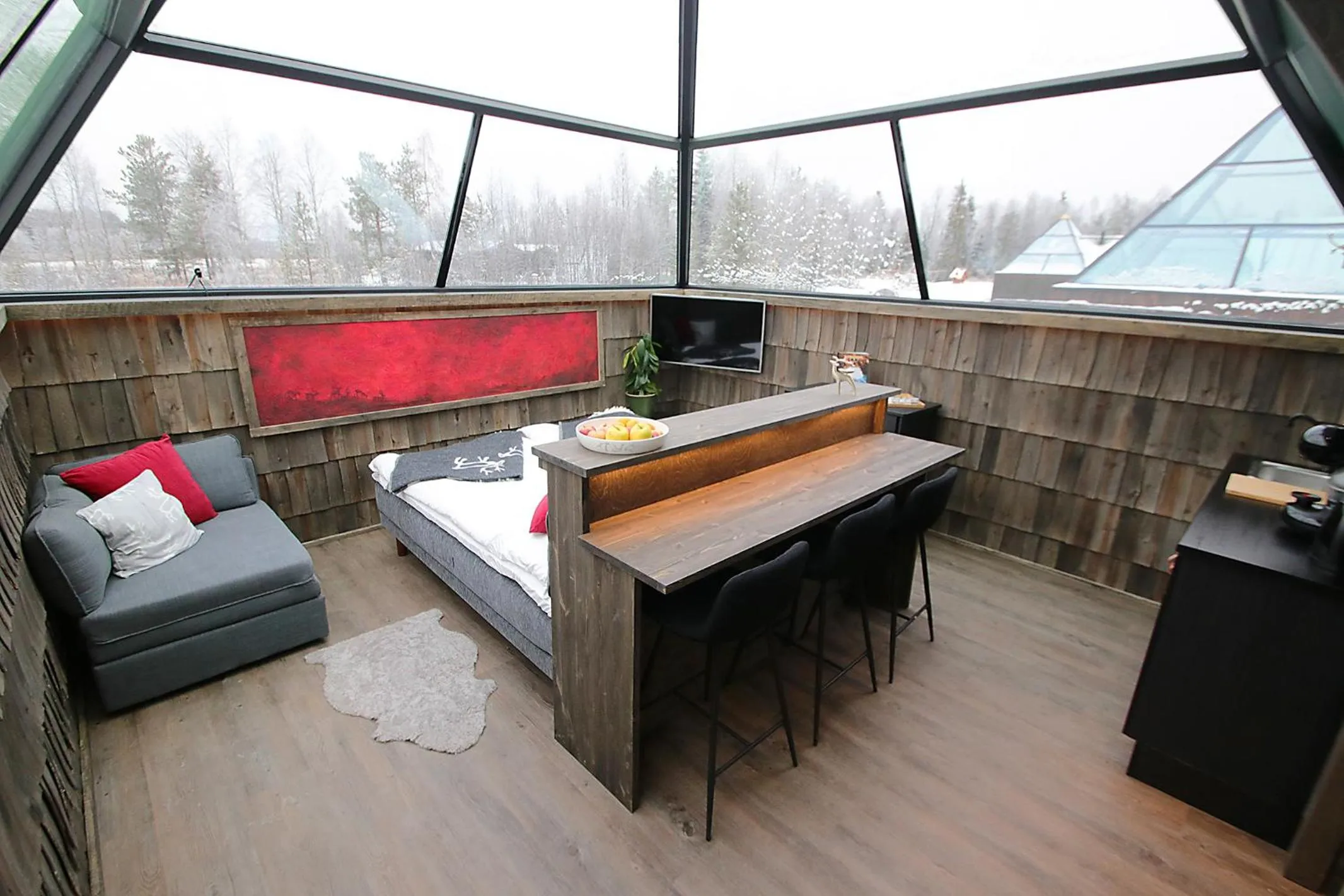 Seating area, Bed in Elves Village Hotel