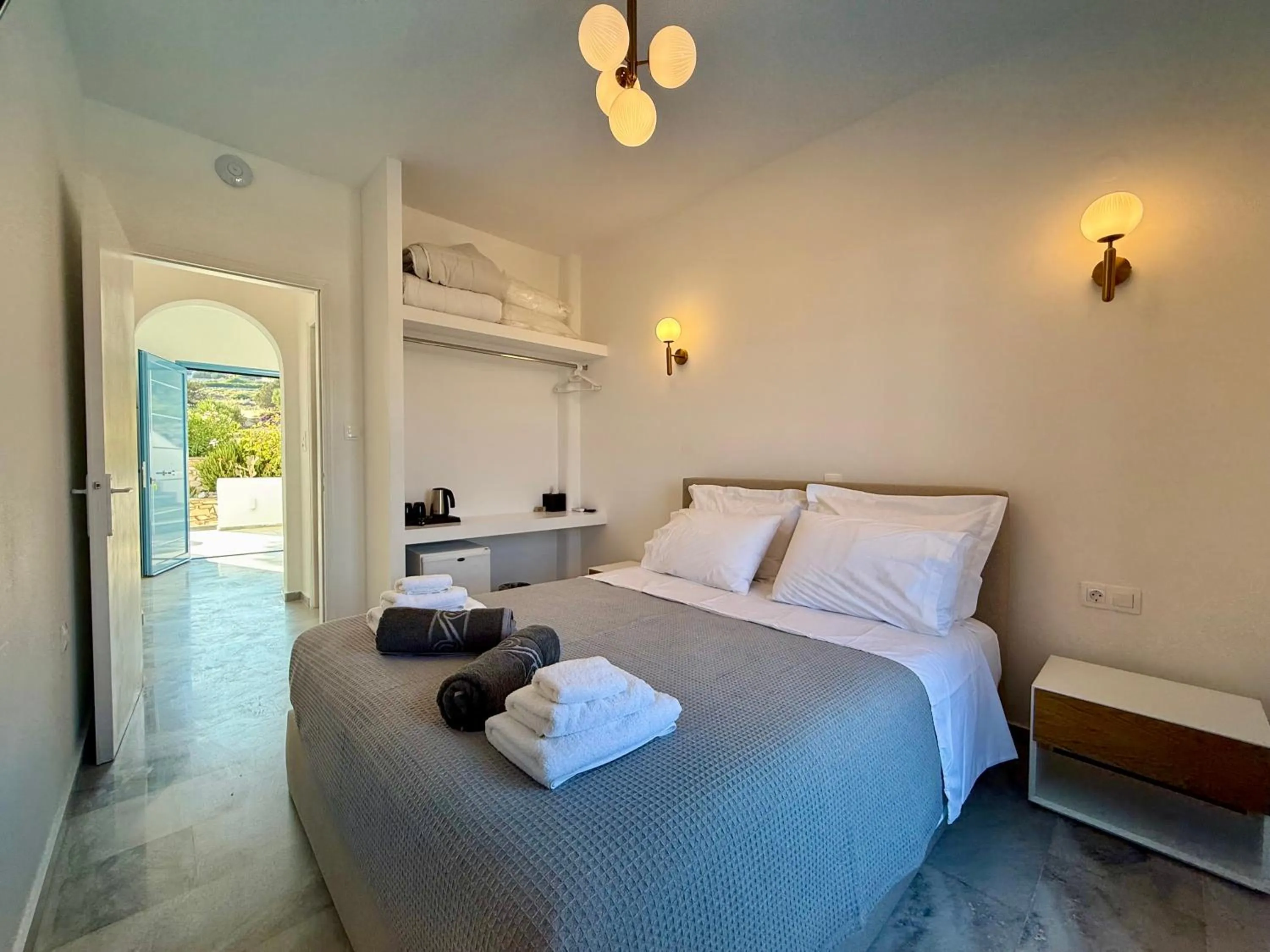 Living room, Bed in Yaleena Residences