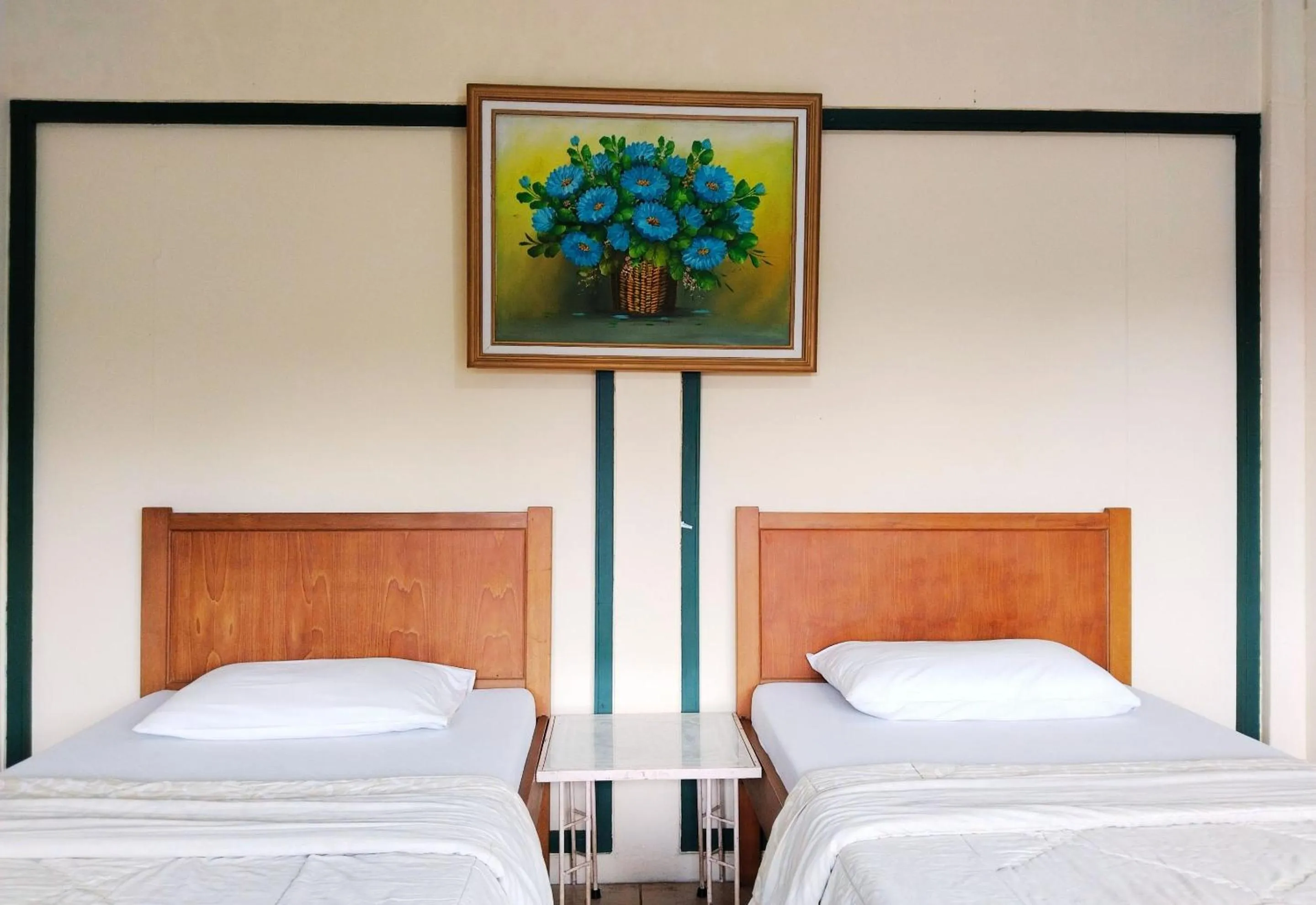 Bed in Hotel Grand Astoeti