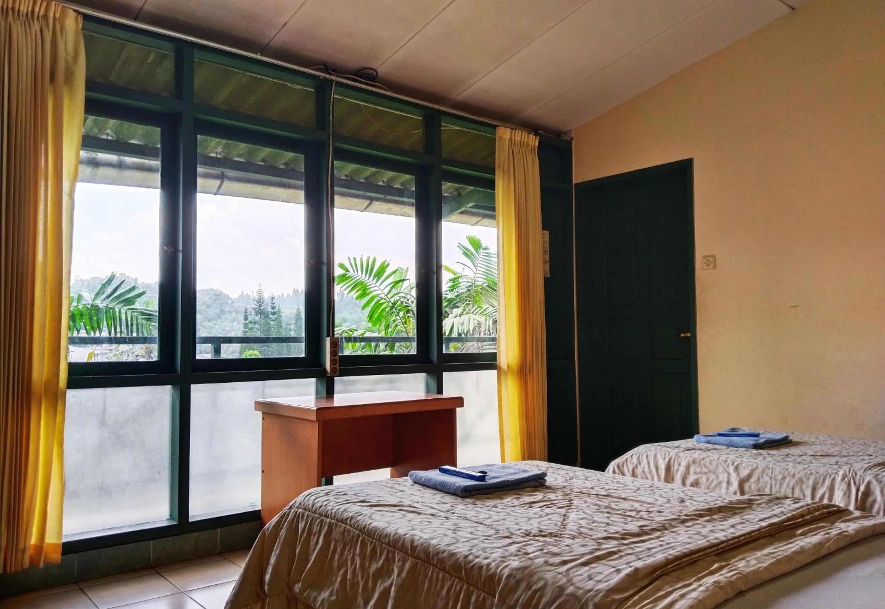 Bed in Hotel Grand Astoeti