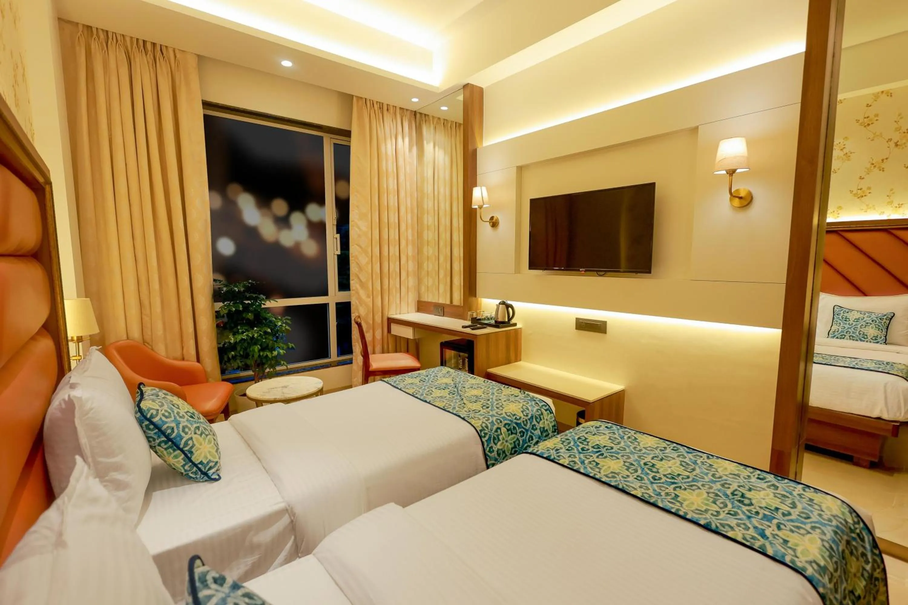 Bed in Shera Hotels & Banquets