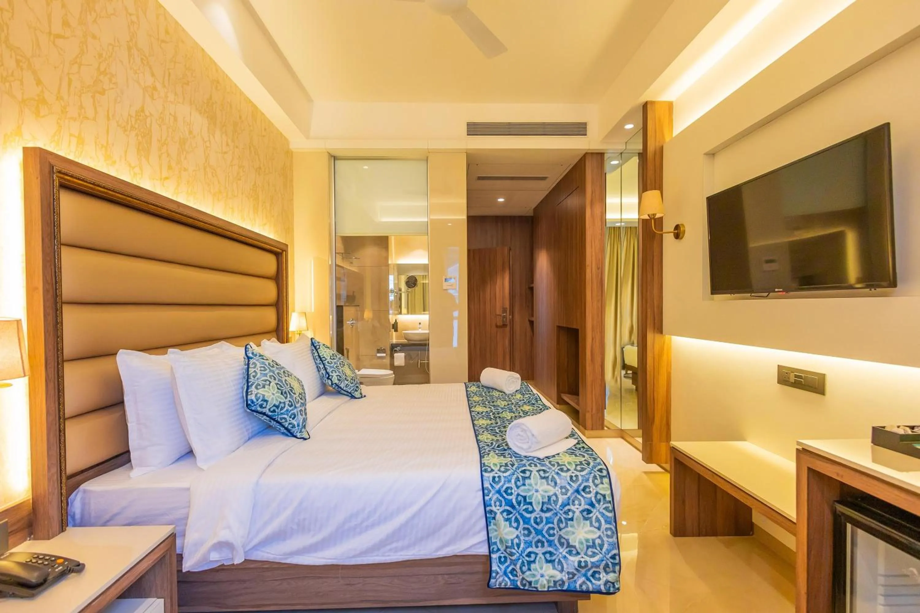 Bed in Shera Hotels & Banquets