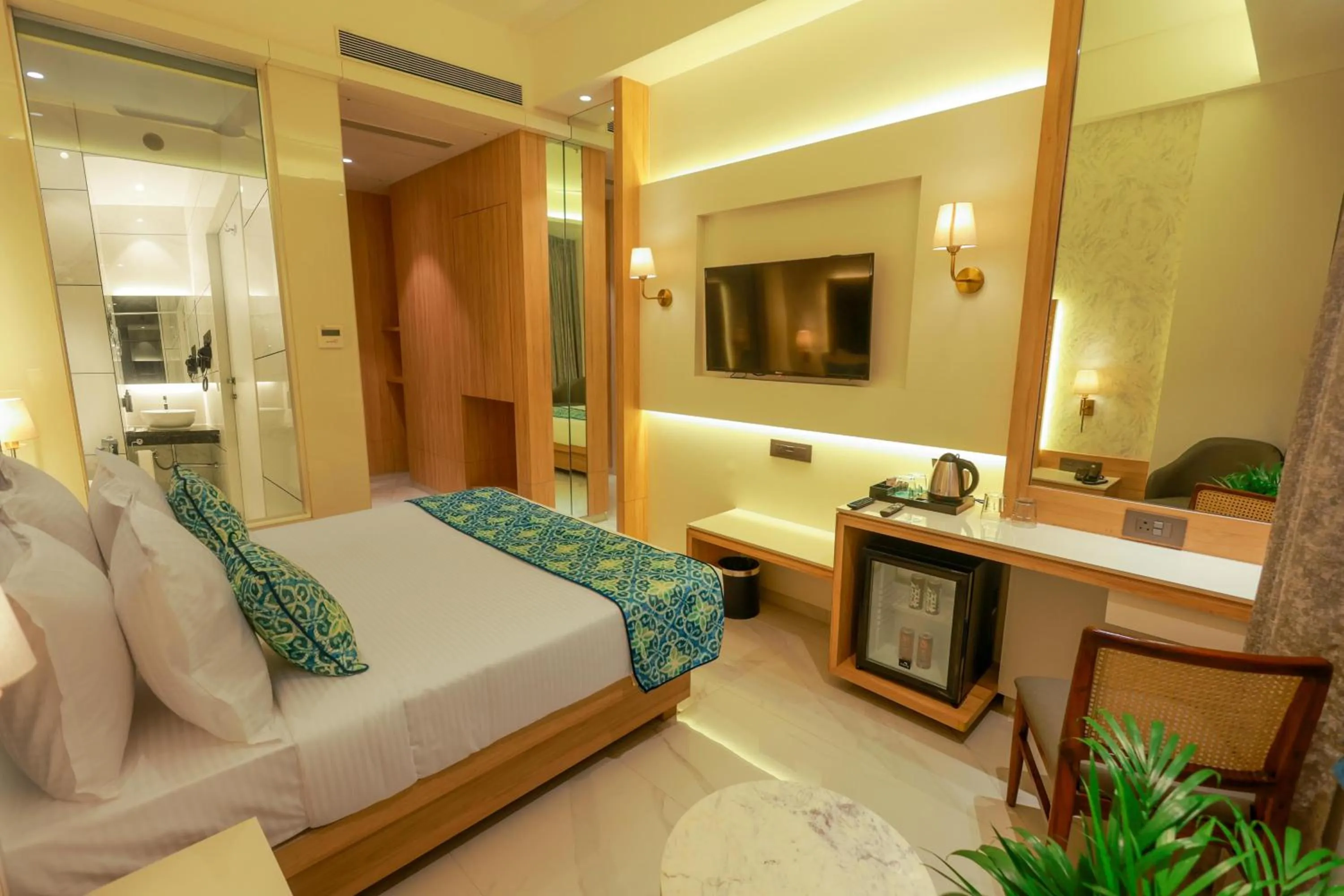 Bed in Shera Hotels & Banquets