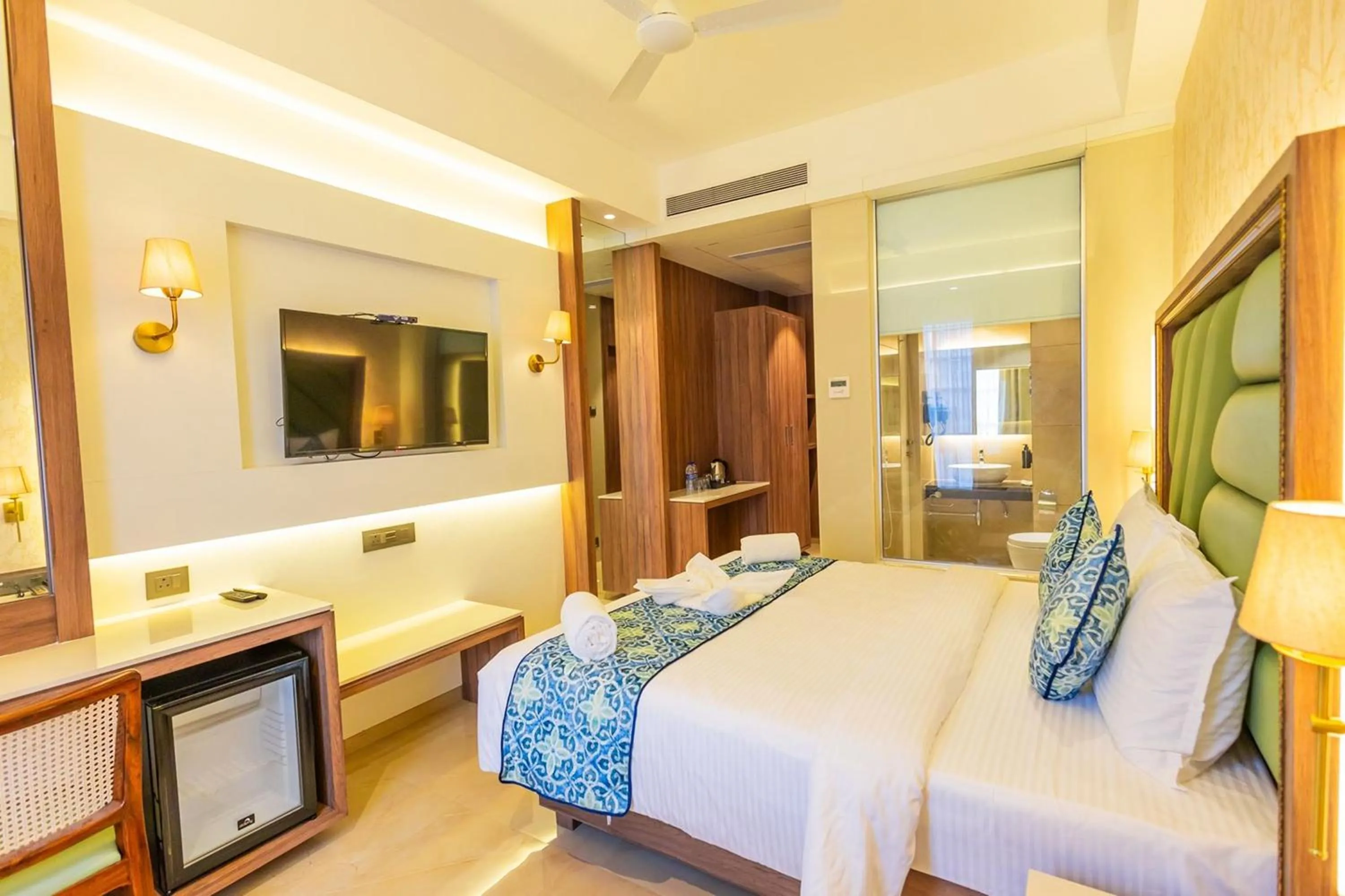 Bed in Shera Hotels & Banquets