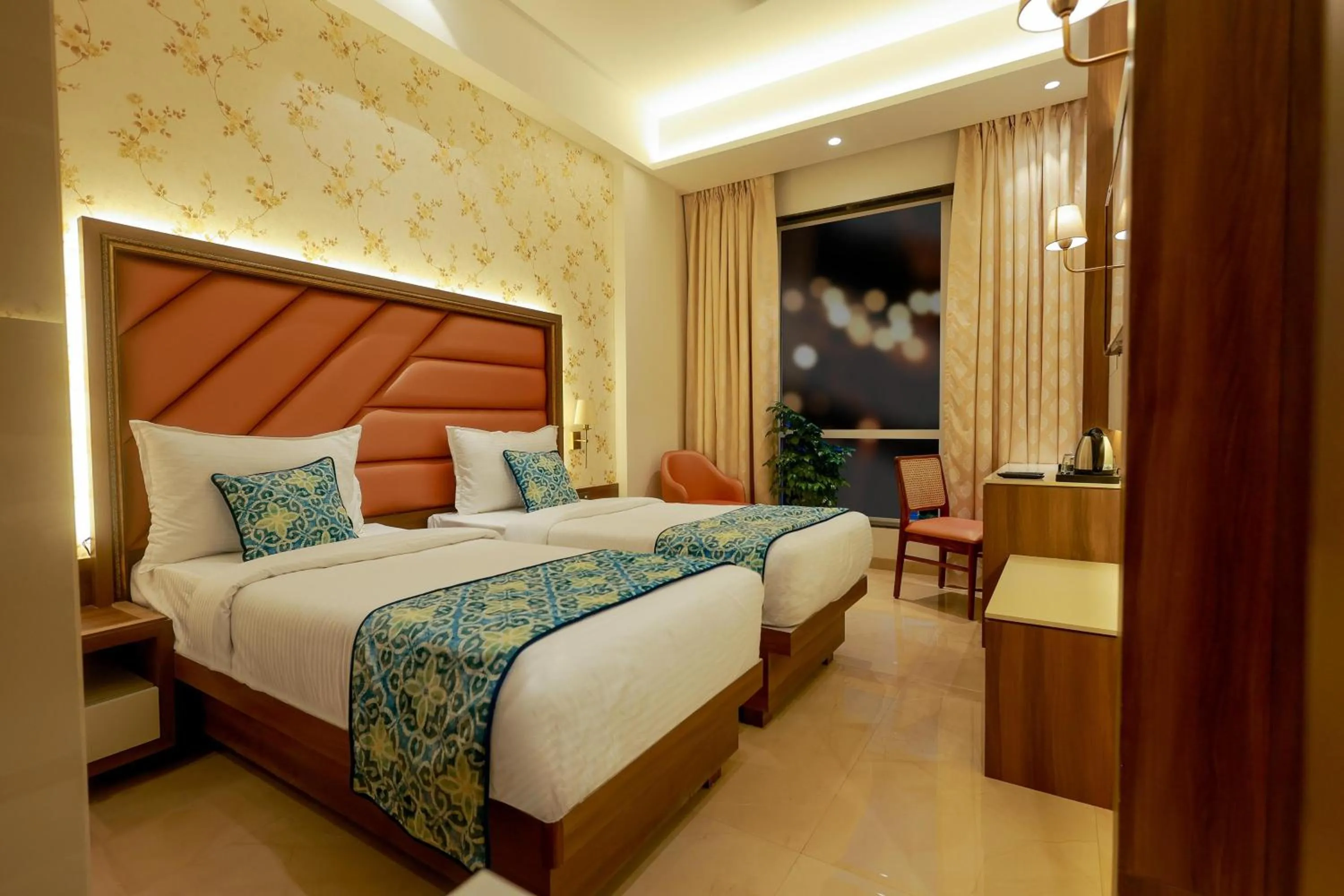 Bed in Shera Hotels & Banquets