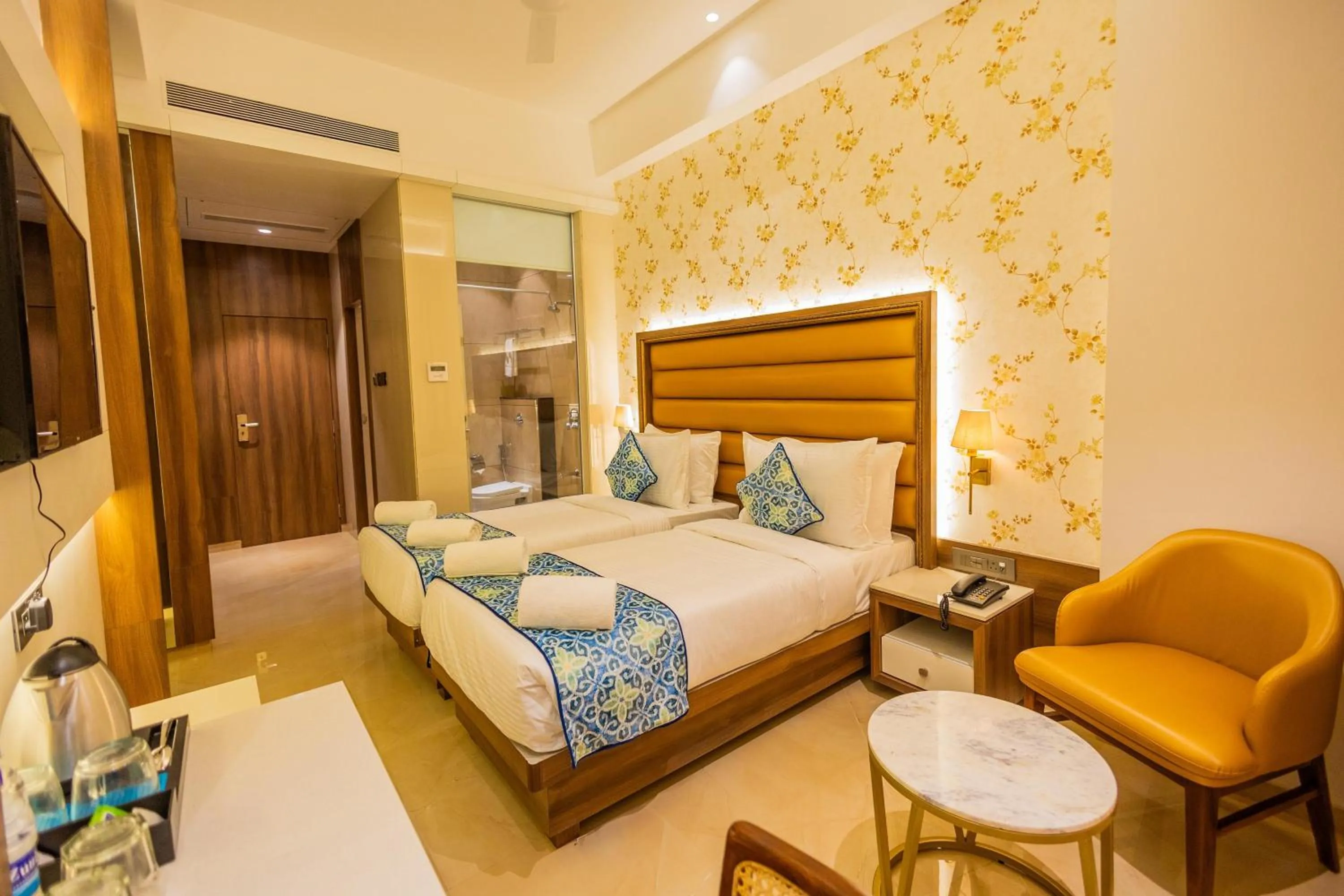 Bed in Shera Hotels & Banquets