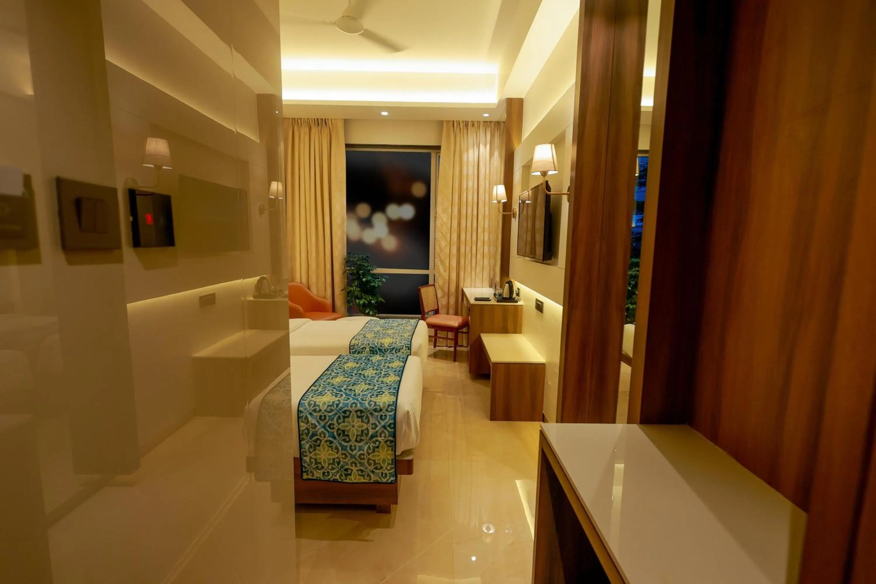 Bed in Shera Hotels & Banquets