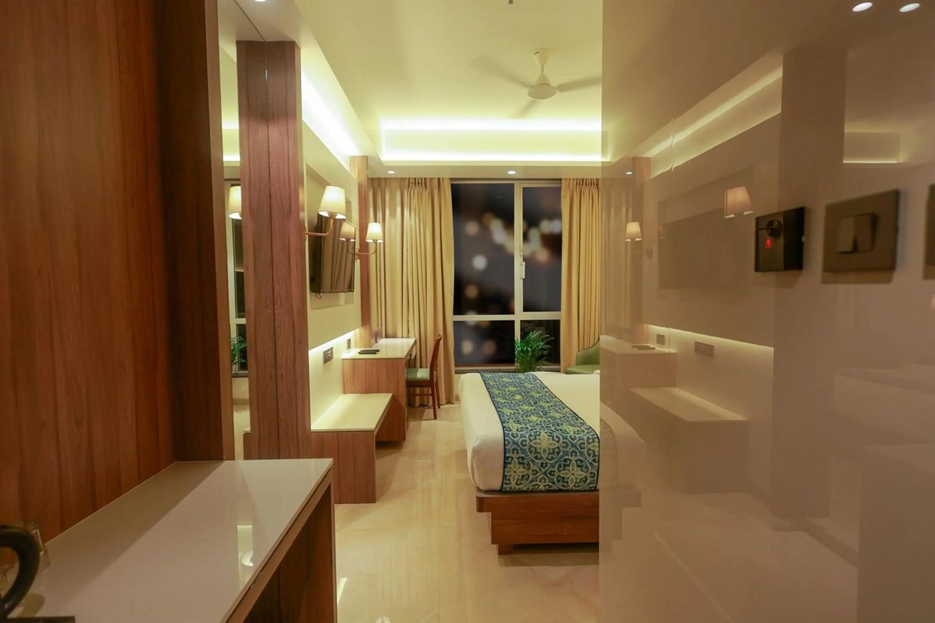 Bed in Shera Hotels & Banquets