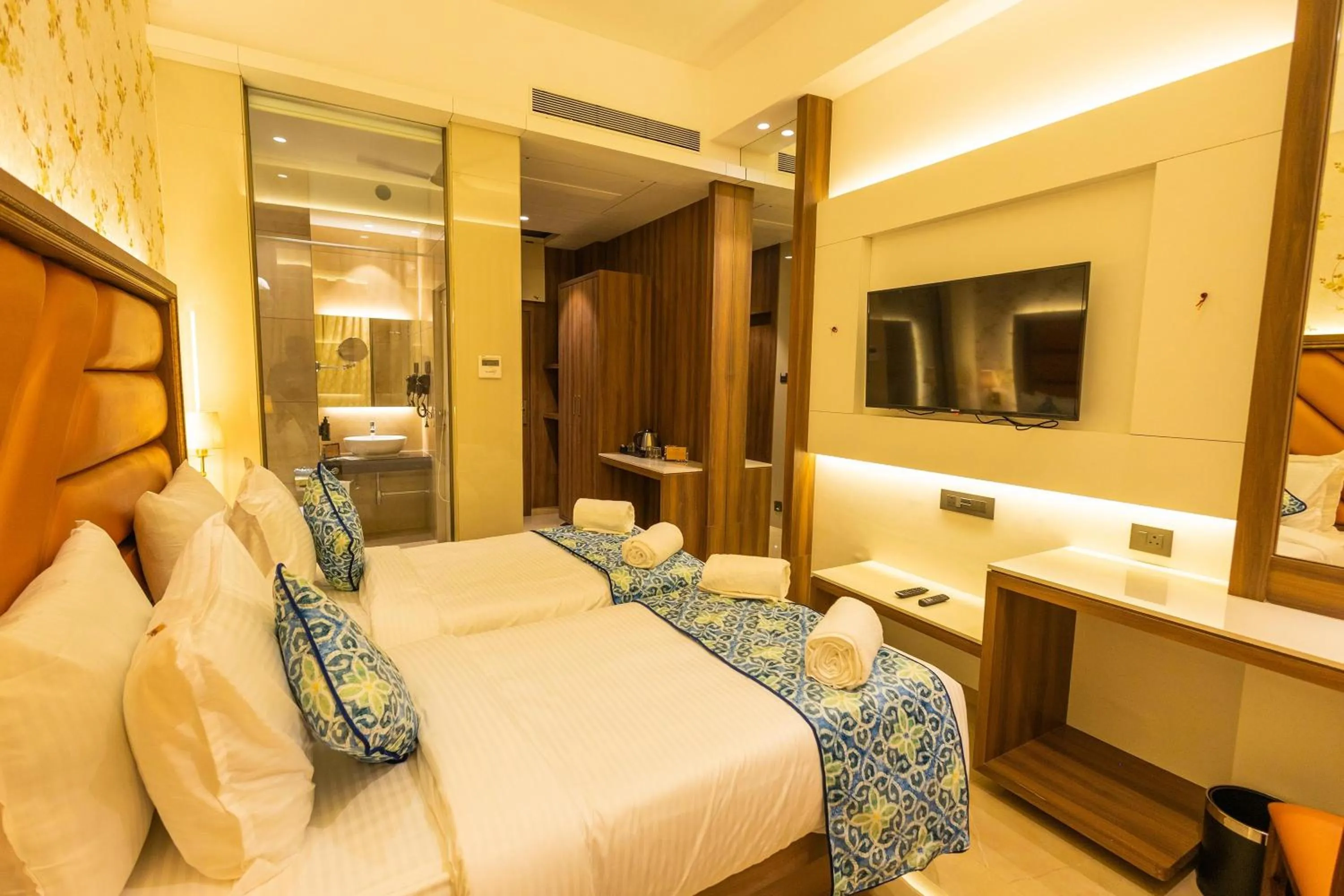 Bed in Shera Hotels & Banquets