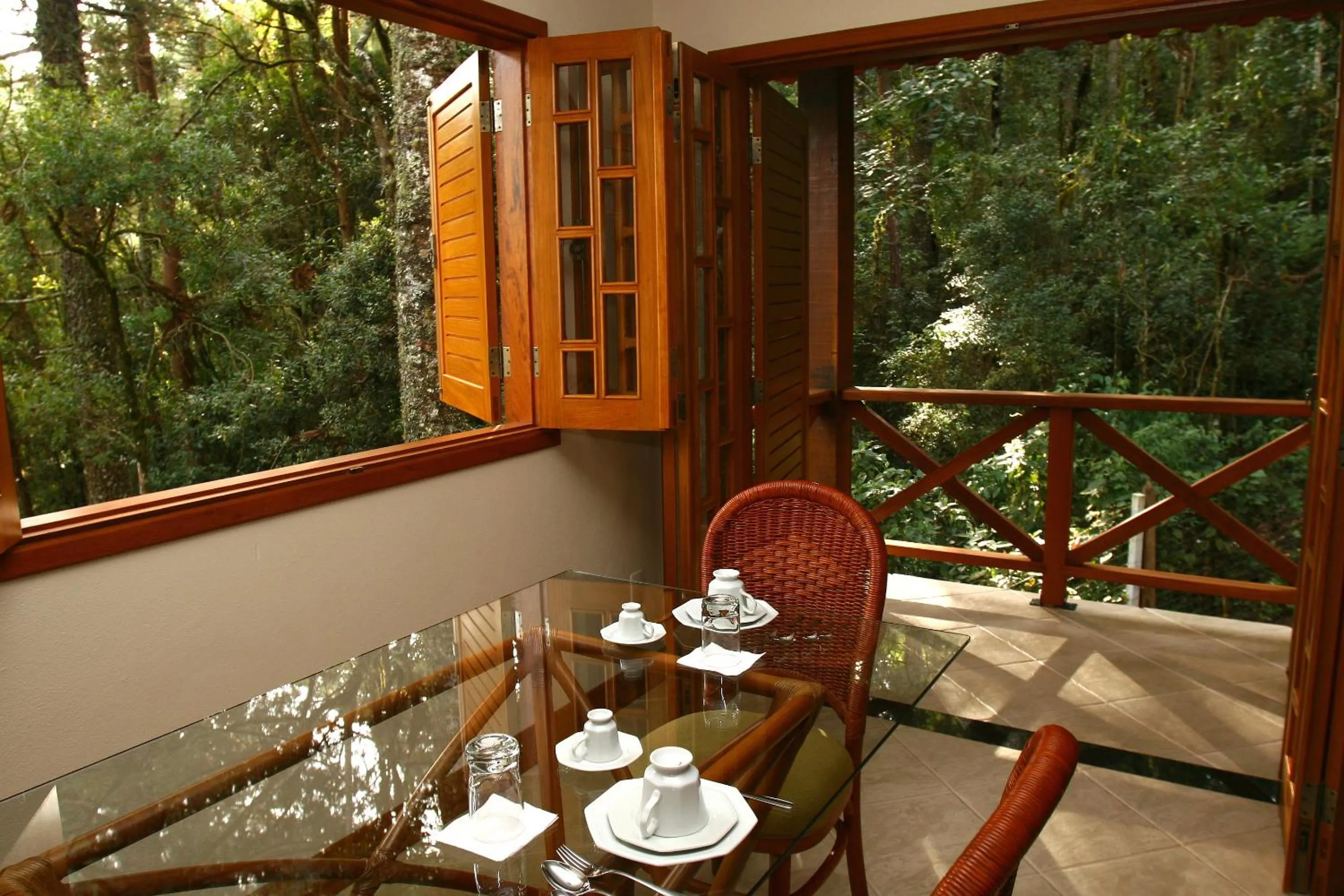Dining area in Pousada Chalé da Floresta