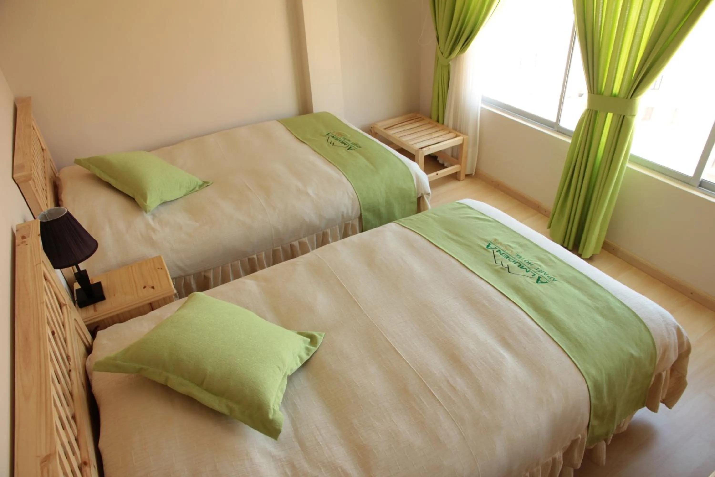 Bed in Almudena Apart Hotel