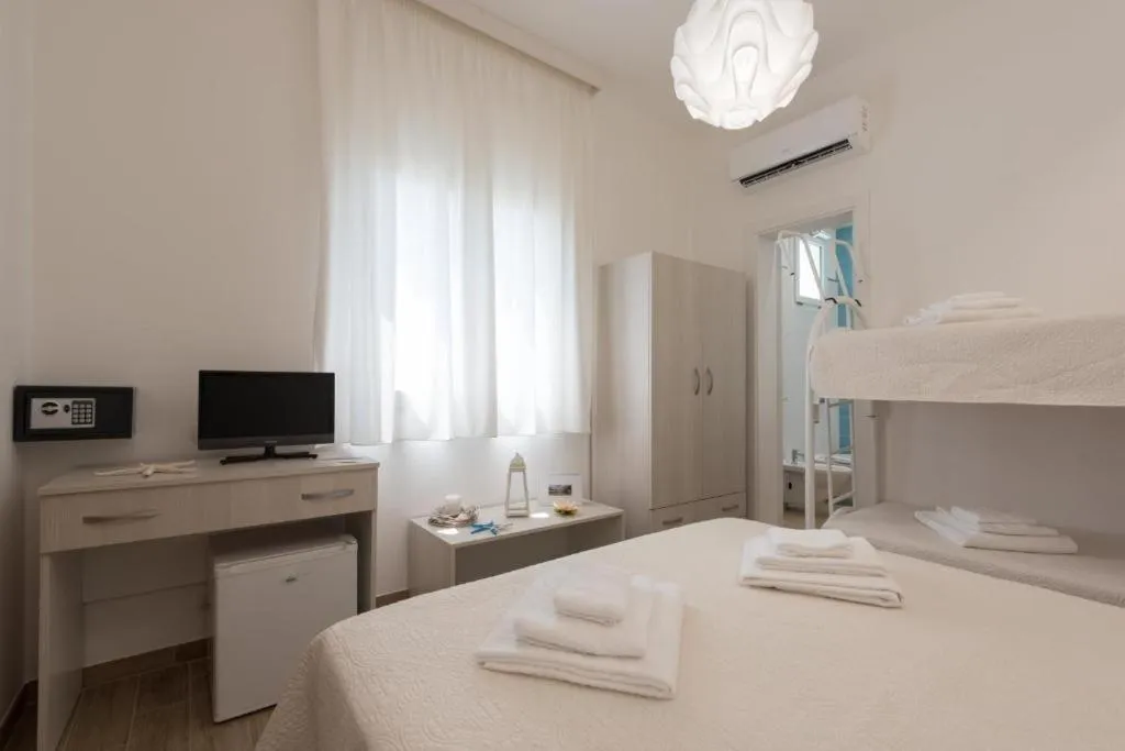 Bed in Le Gemelle Boutique Hotel