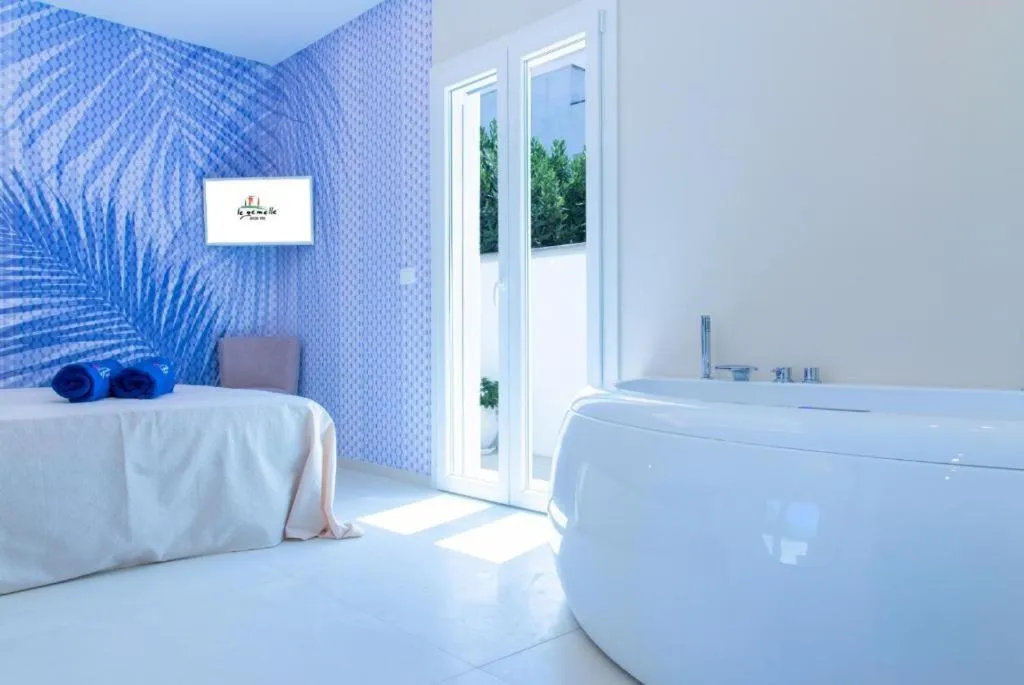 Bed in Le Gemelle Boutique Hotel