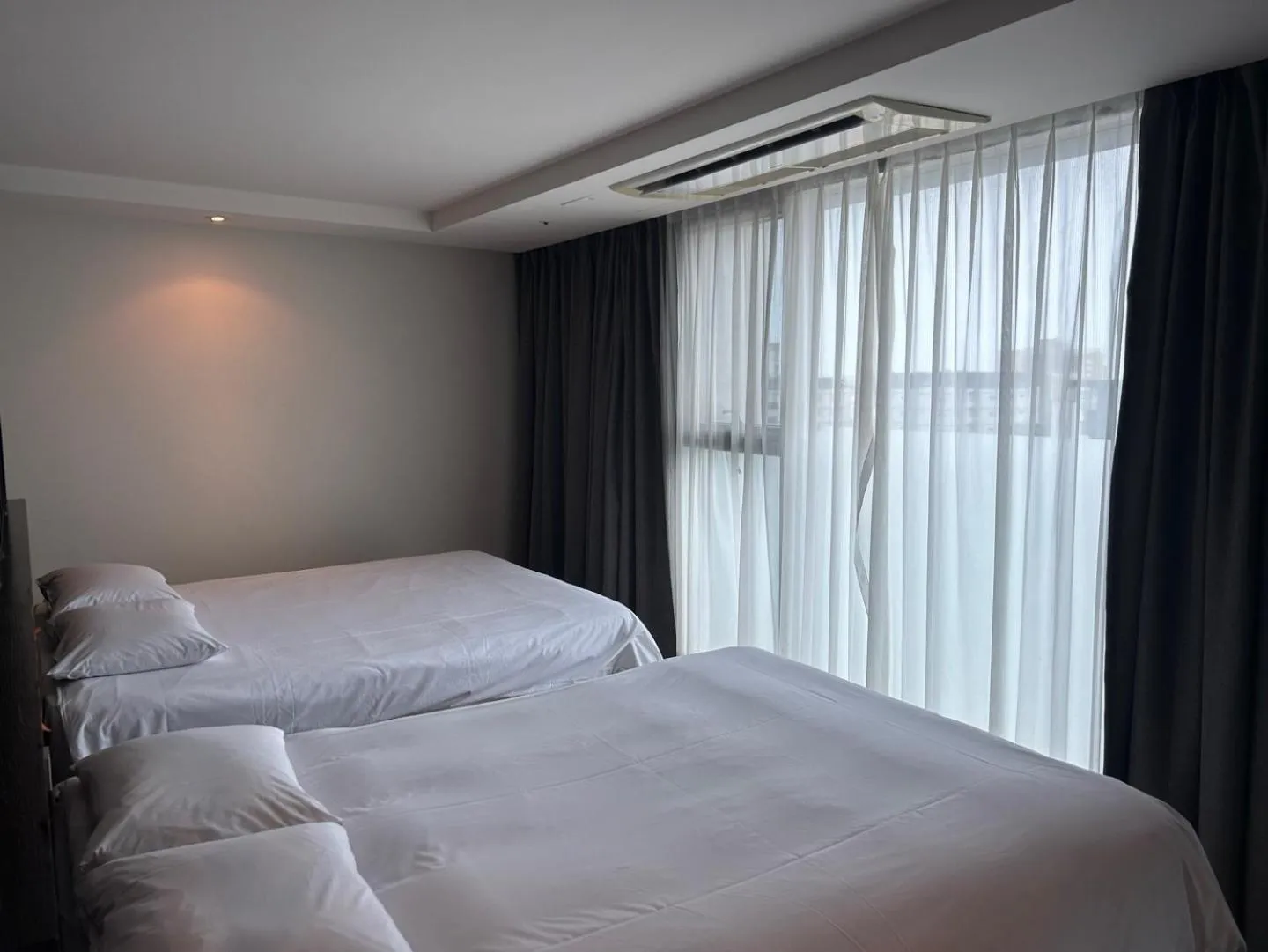 Bed in Sungsan Marina Hotel