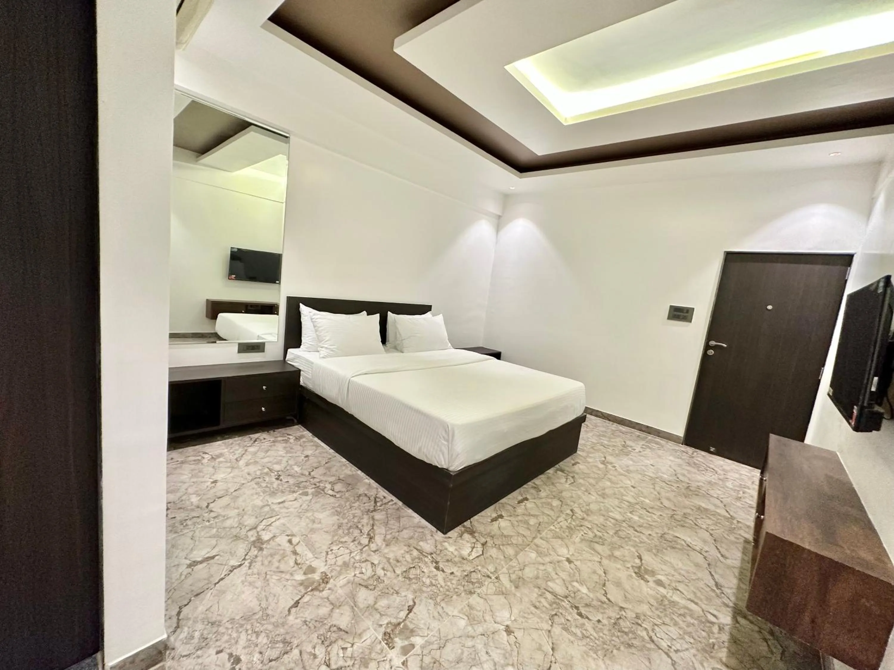 Bed in TAKHT- Executive Suites and Rooms