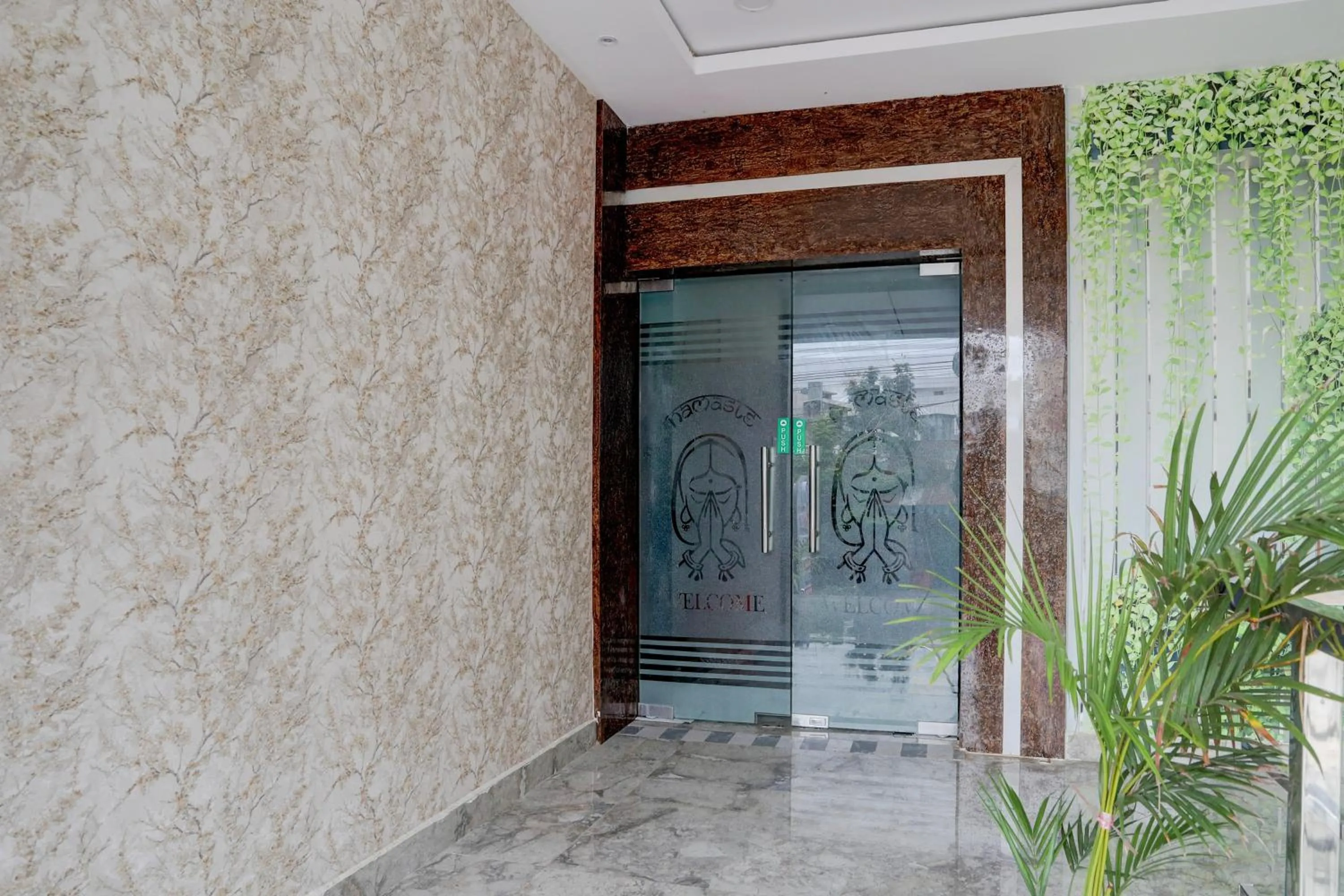 Facade/entrance in Super Townhouse Khammam Formerly Bluemoon