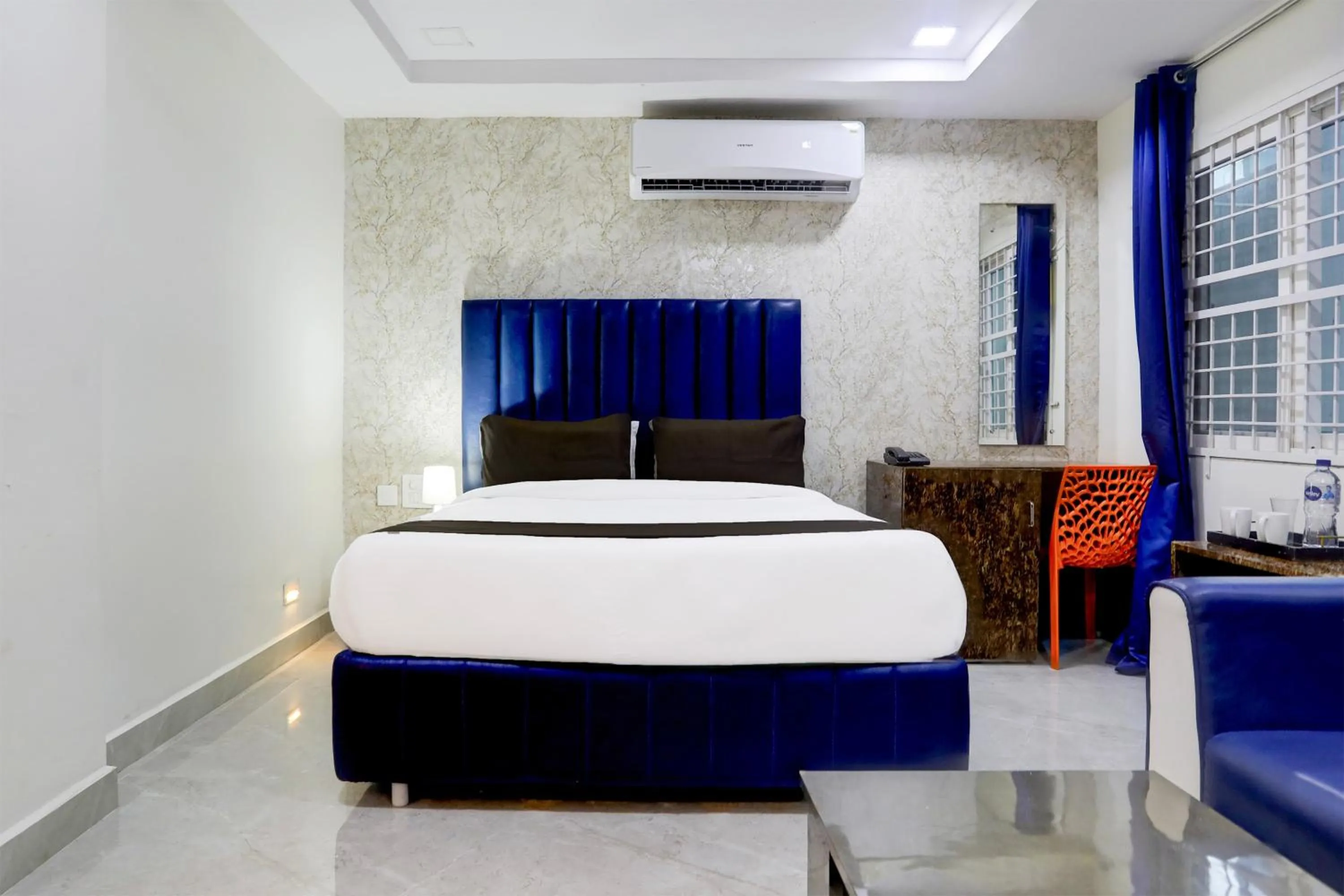 Bedroom, Bed in Super Townhouse Khammam Formerly Bluemoon