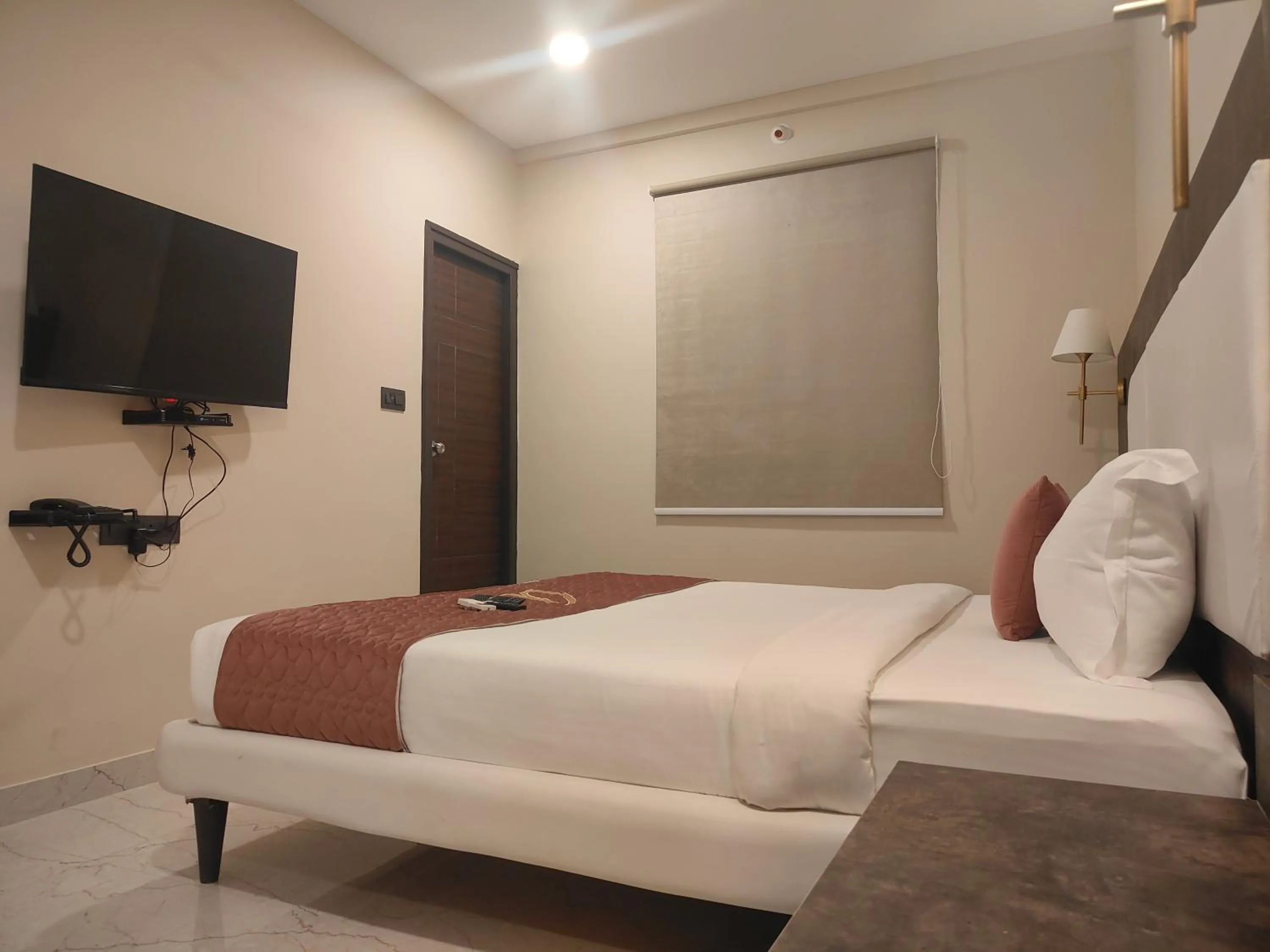 Bed in Astra Hotels and Suites - Sector 7 HSR Layout