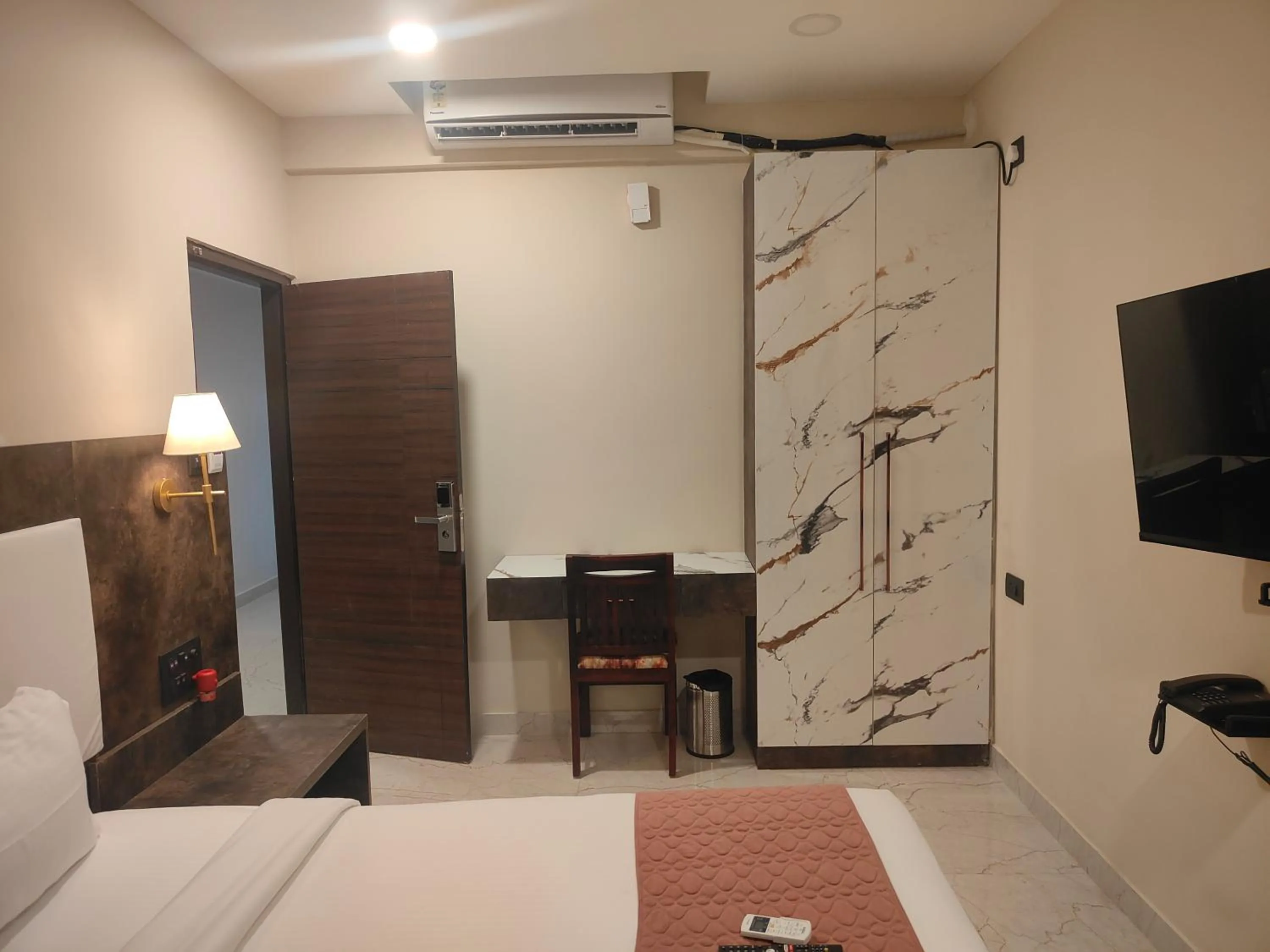 Bed in Astra Hotels and Suites - Sector 7 HSR Layout