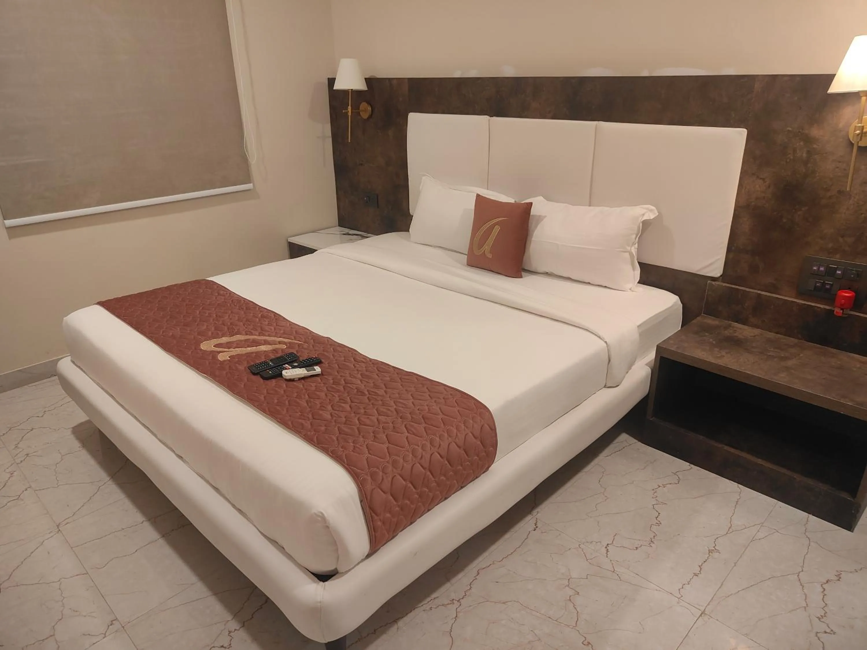 Bed in Astra Hotels and Suites - Sector 7 HSR Layout