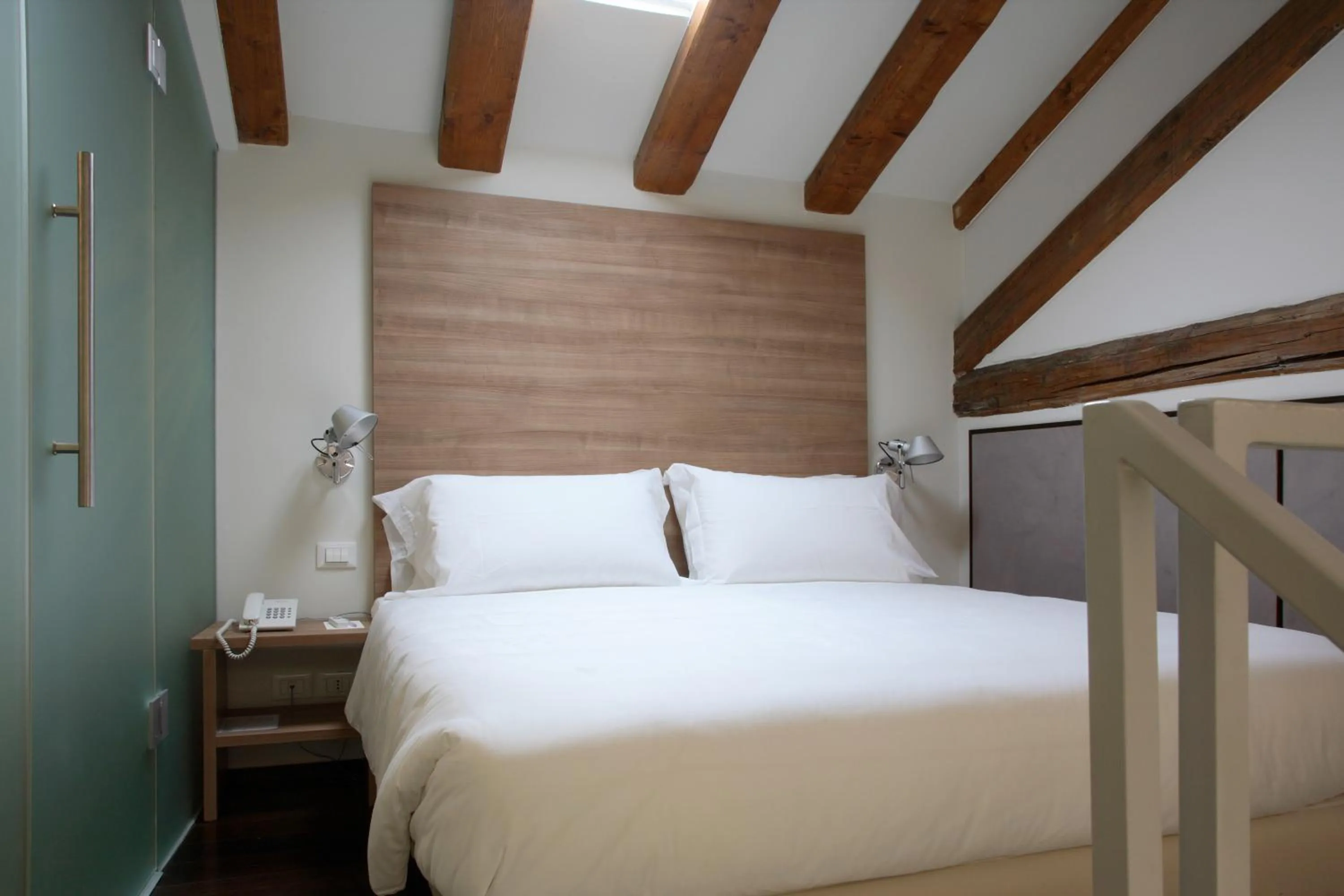 Bed in Hotel Palladio