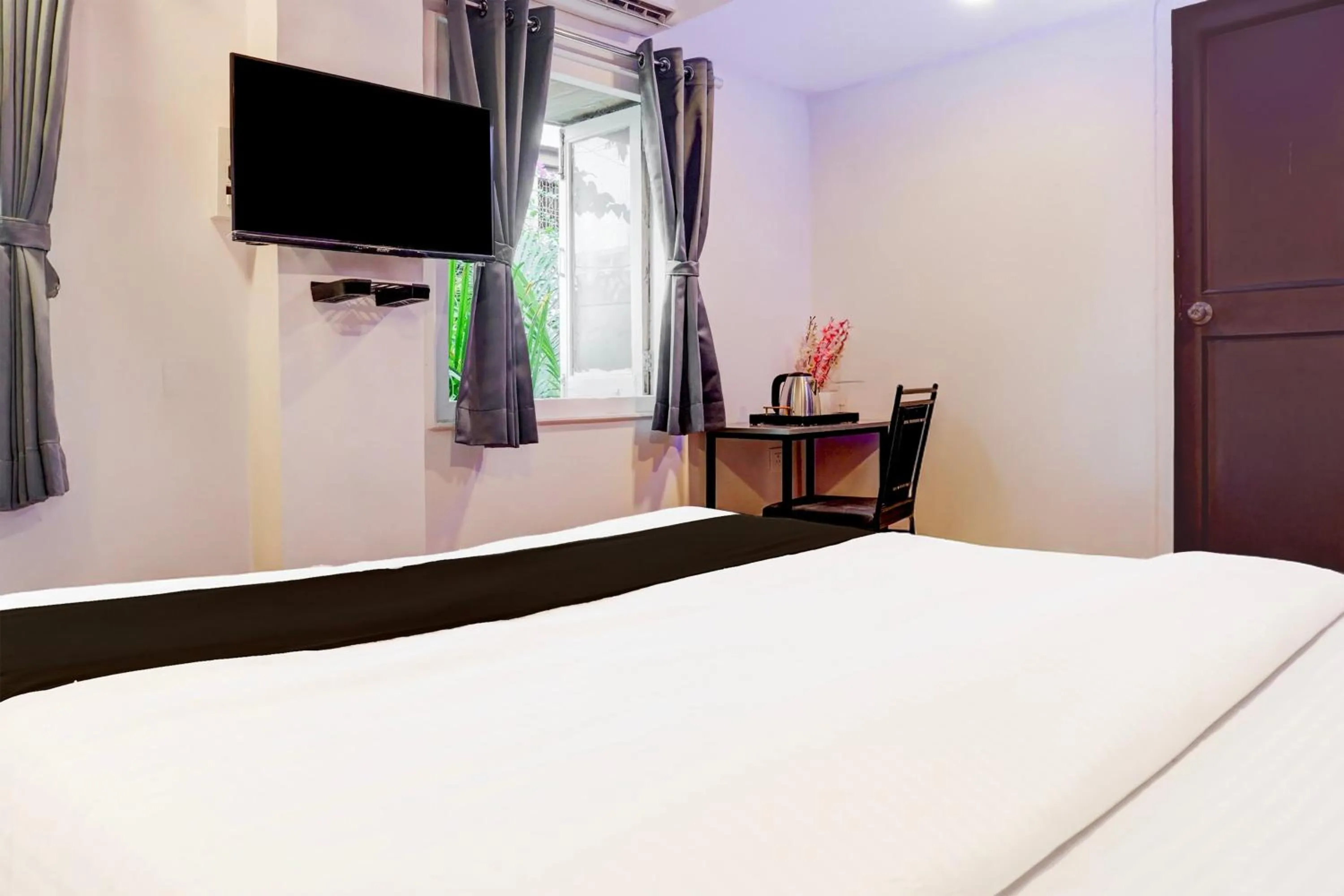 Bedroom, Bed in Super Hotel O Bopodi Near Pune IT Park